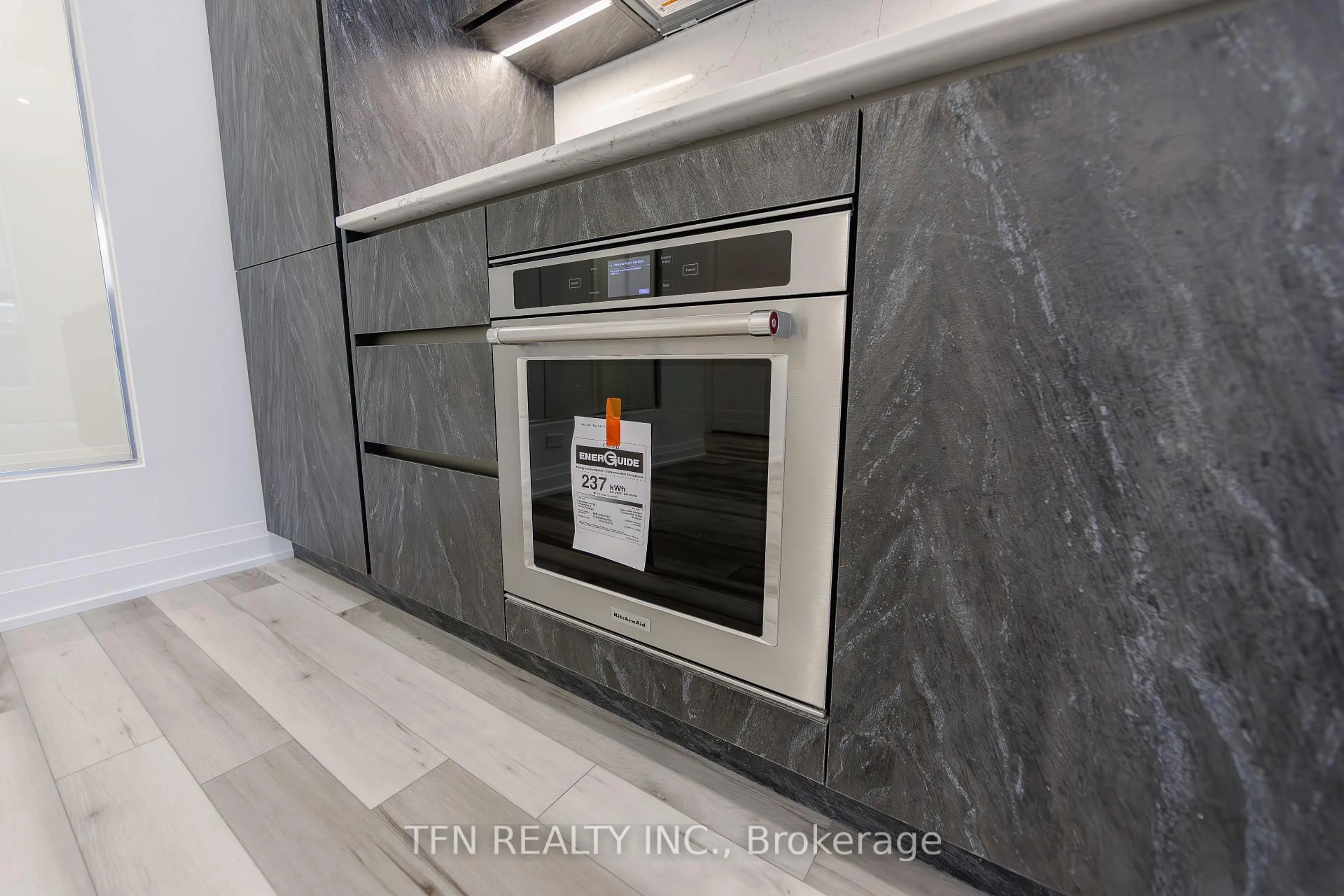 Contemporary kitchen, ceramic/tile floor for 15 Richardson St #531, Toronto Ontario M5A 0Y5