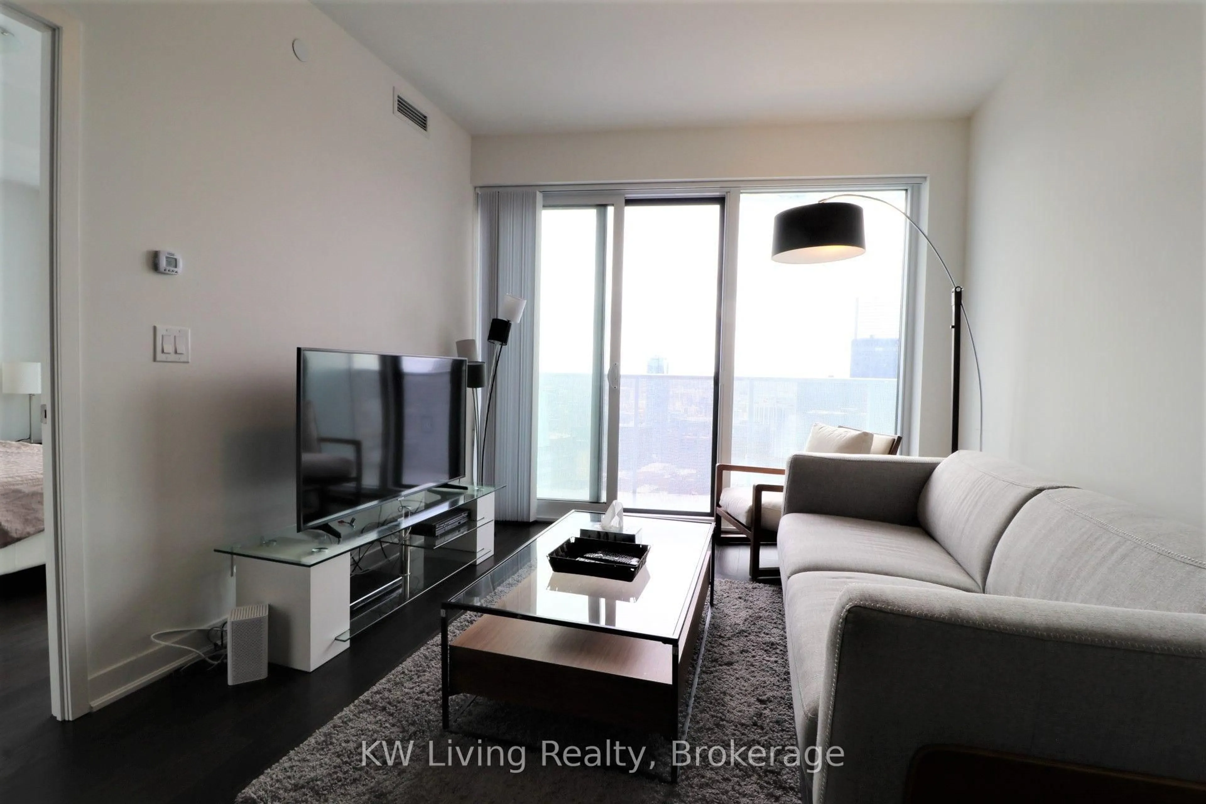 Living room with furniture, unknown for 88 Harbour St #6703, Toronto Ontario M5J 0C3