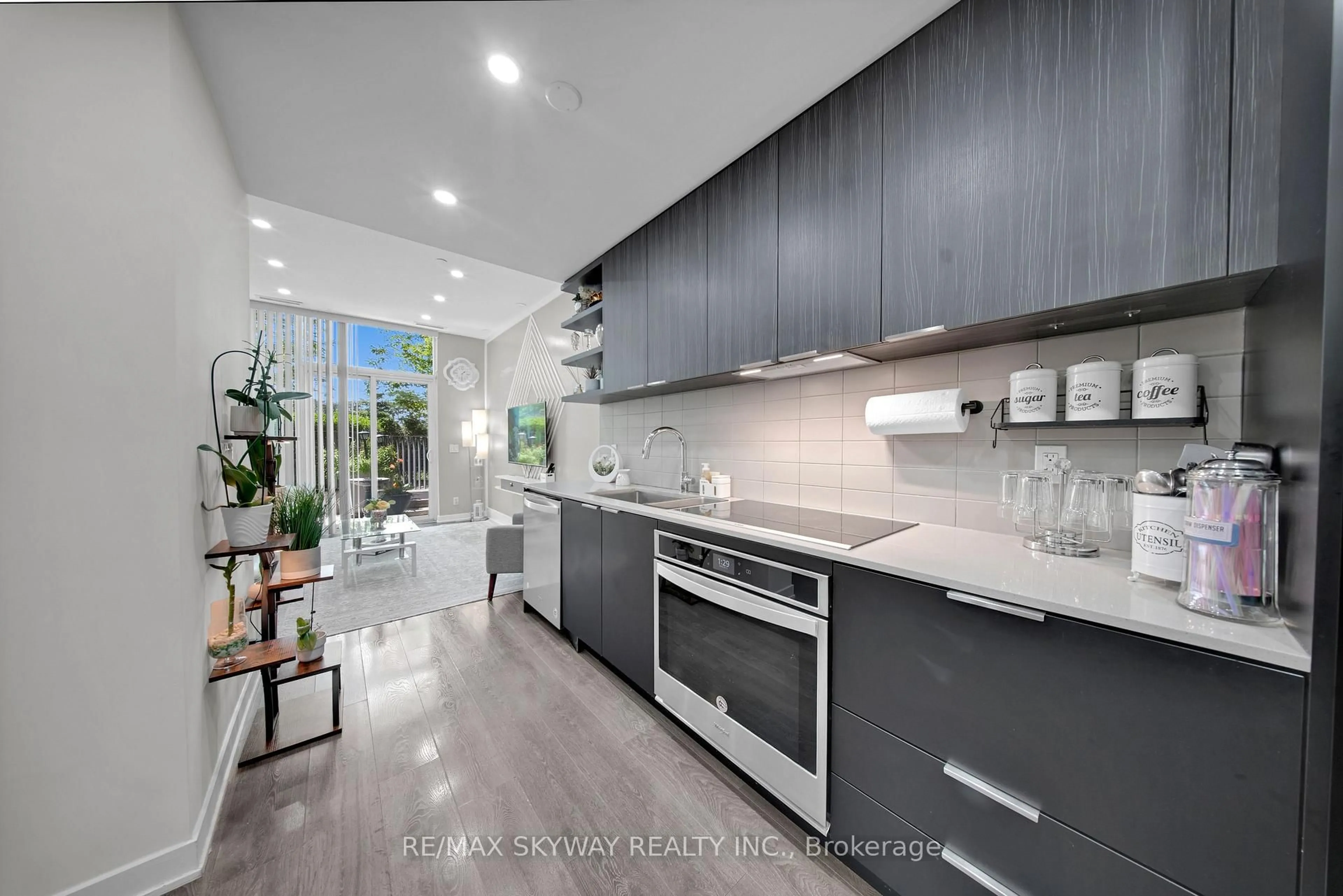 Contemporary kitchen, ceramic/tile floor for 6 sonic Way #103, Toronto Ontario M3C 0P1