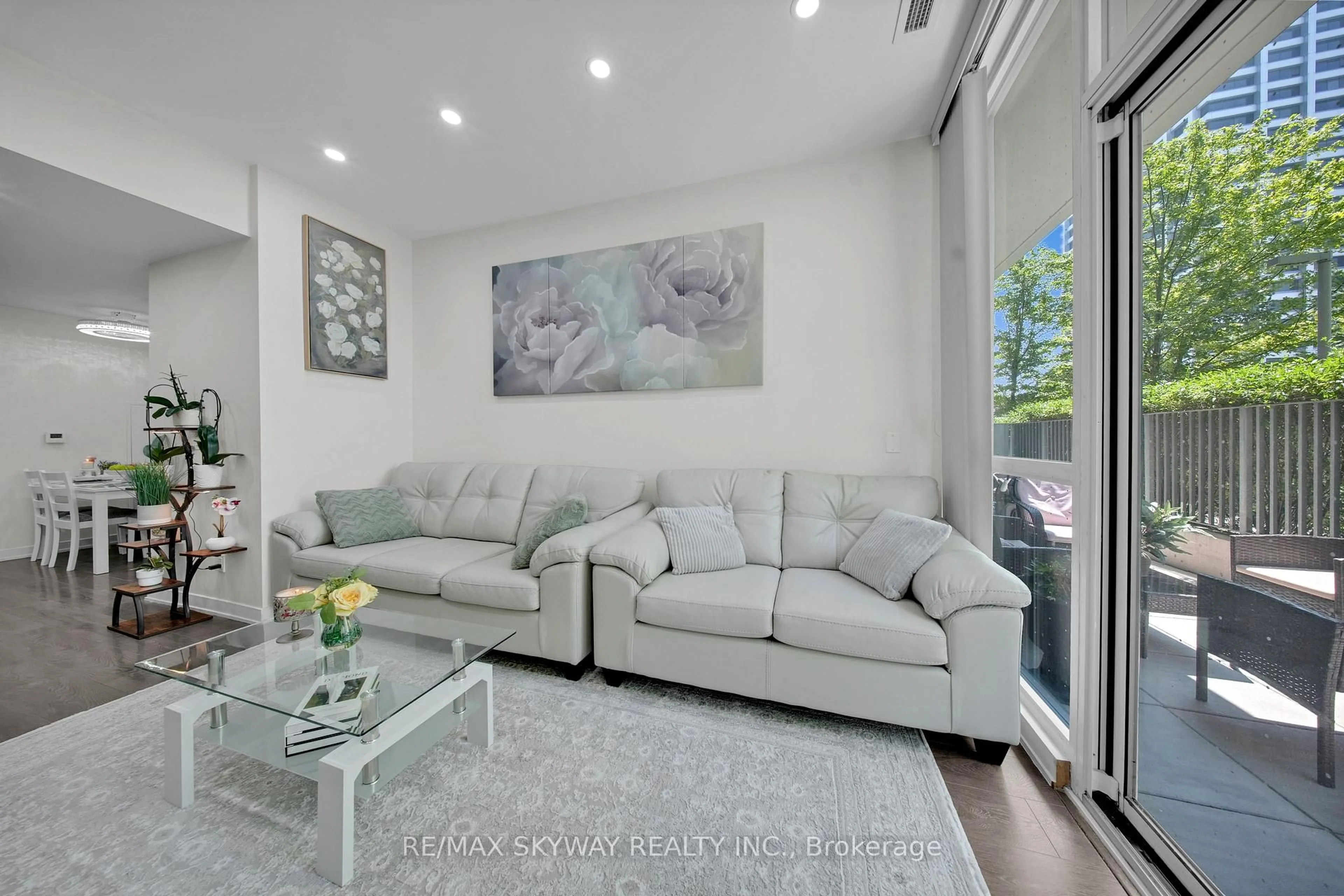 Living room with furniture, unknown for 6 sonic Way #103, Toronto Ontario M3C 0P1