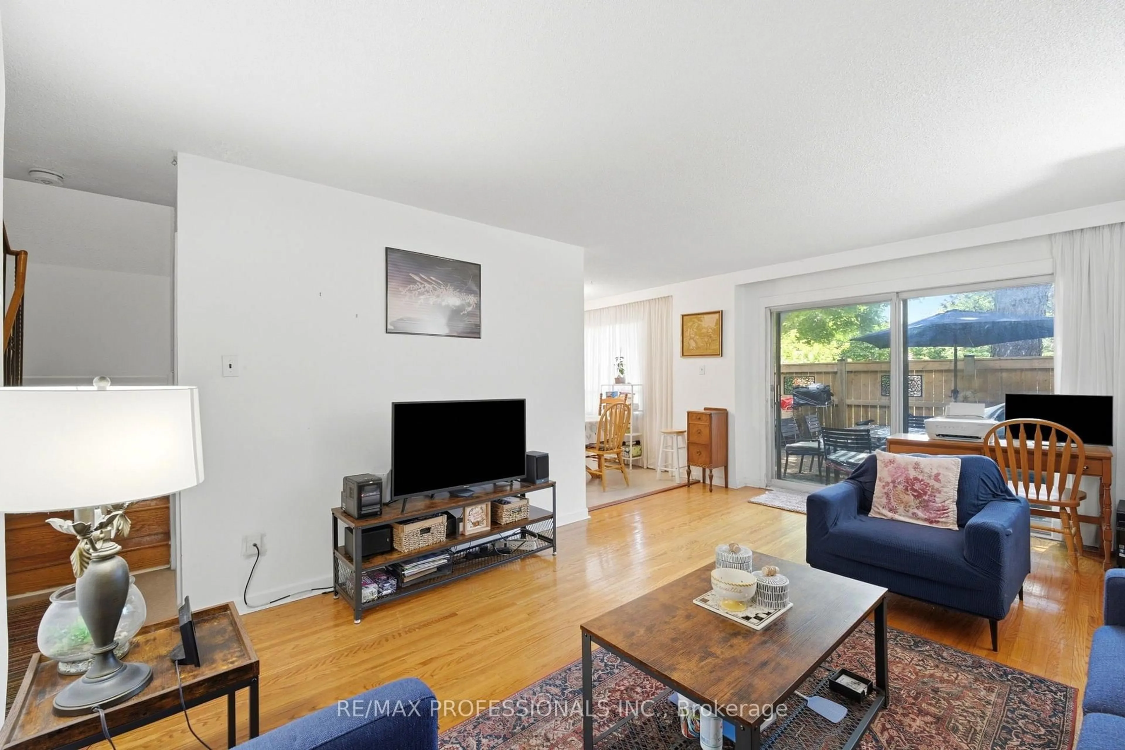 Living room with furniture, unknown for 48 Three Valleys Dr #12, Toronto Ontario M3A 3B5