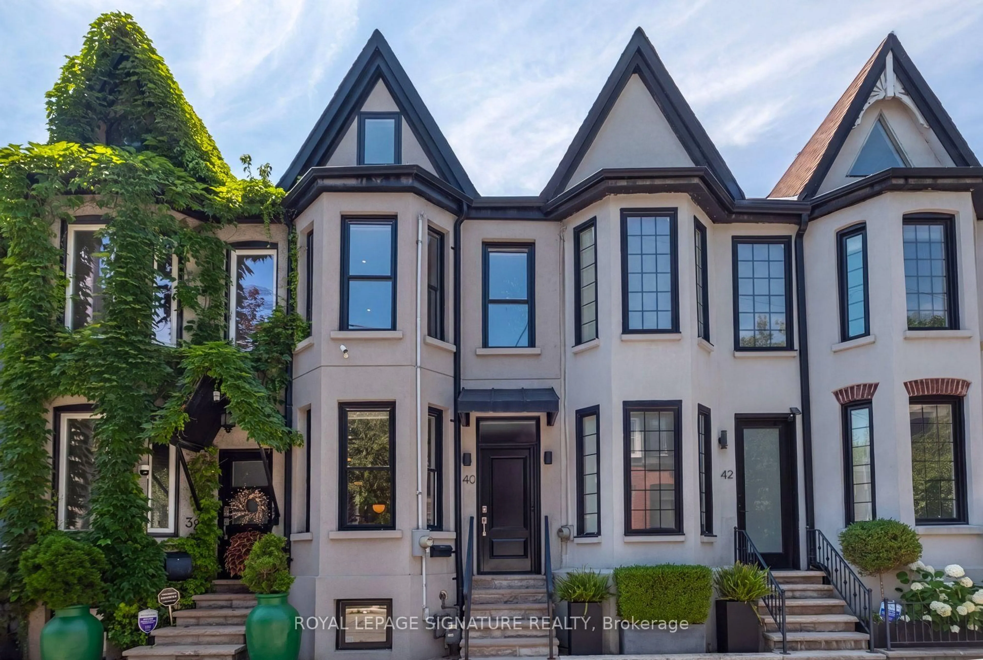 Home with brick exterior material, street for 40 Bright St, Toronto Ontario M5A 3H4