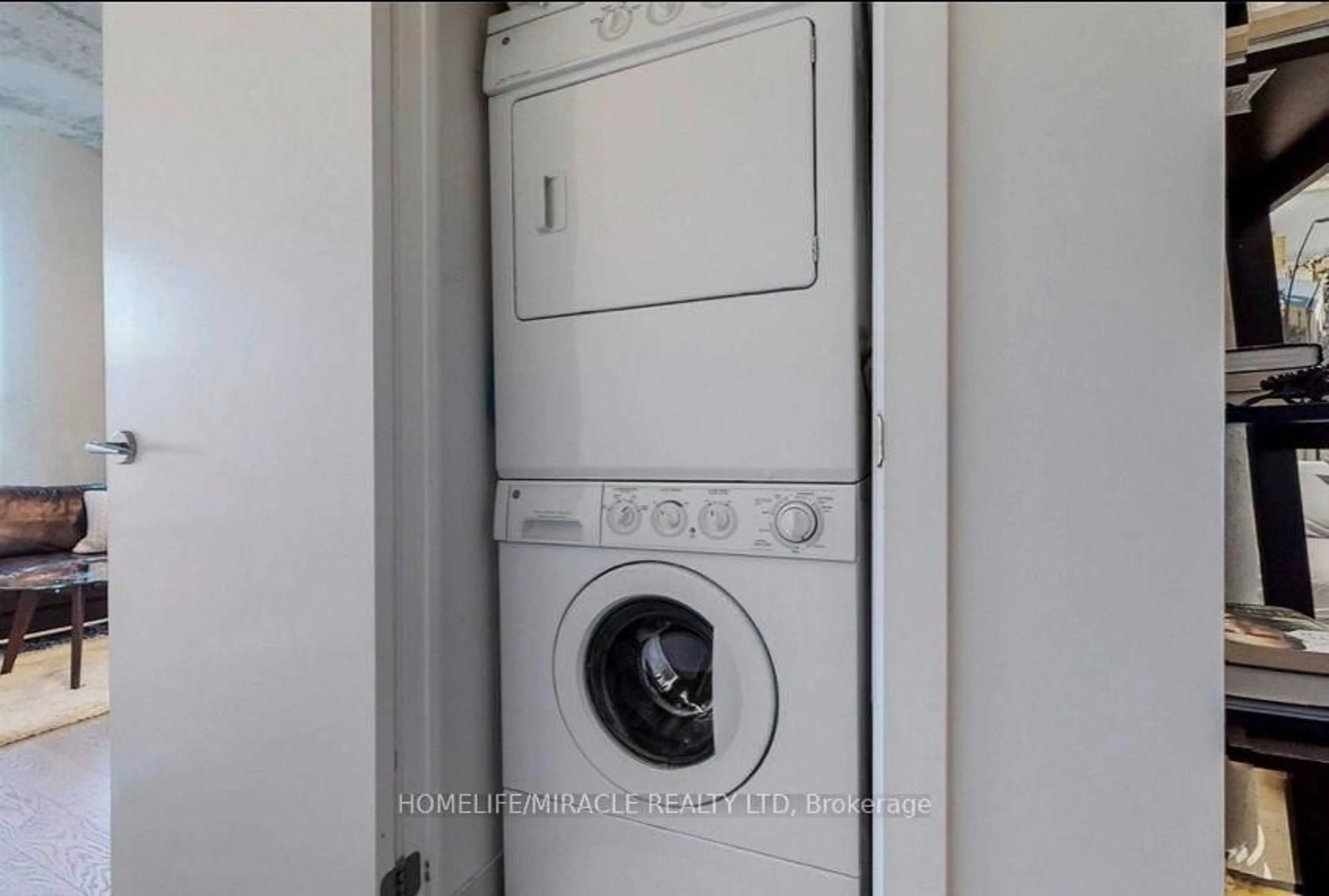 Laundry room for 318 King St #207, Toronto Ontario M5A 1C1