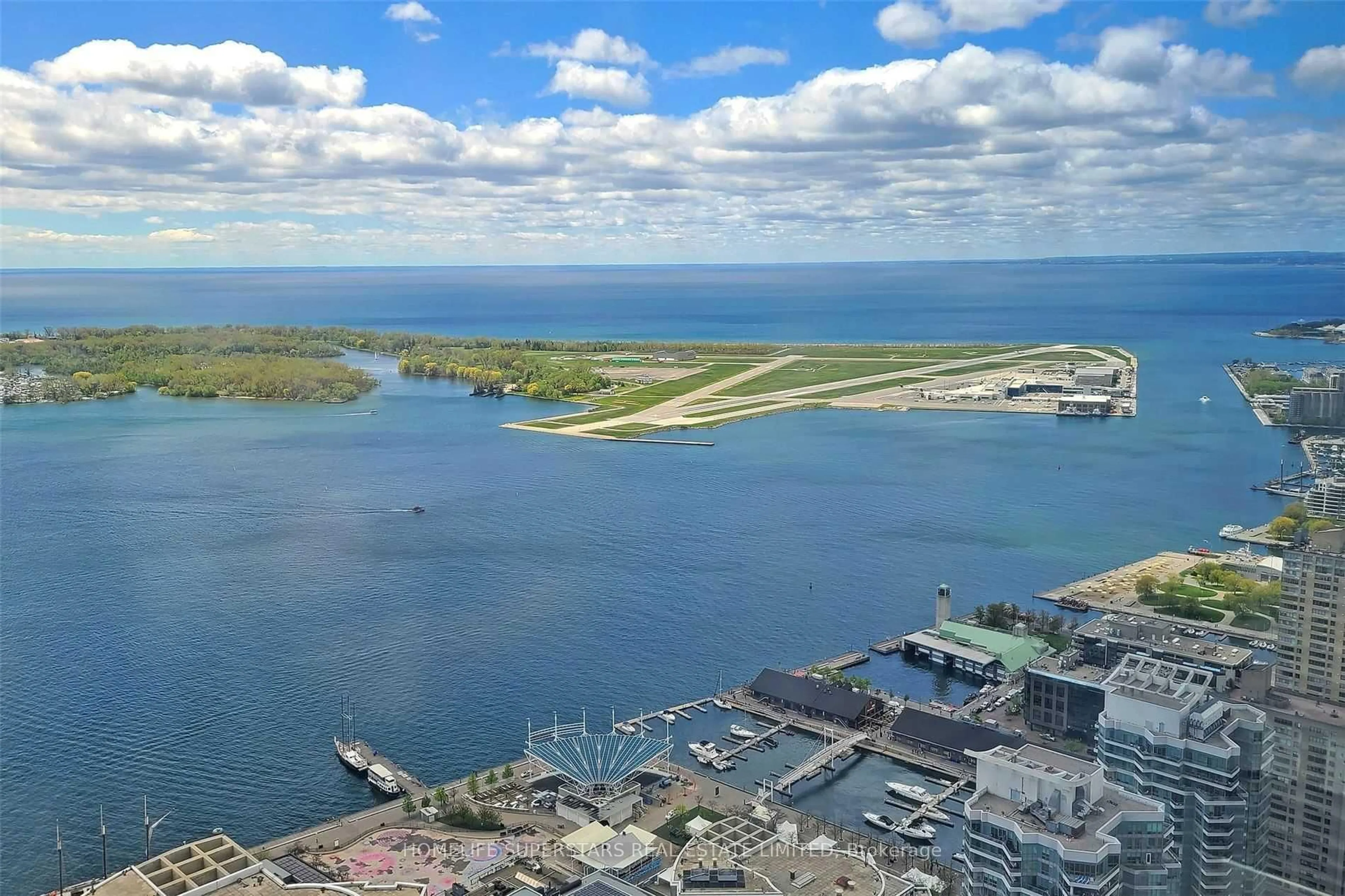 A pic from outside/outdoor area/front of a property/back of a property/a pic from drone, water/lake/river/ocean view for 10 York St #6108, Toronto Ontario M5J 0E1