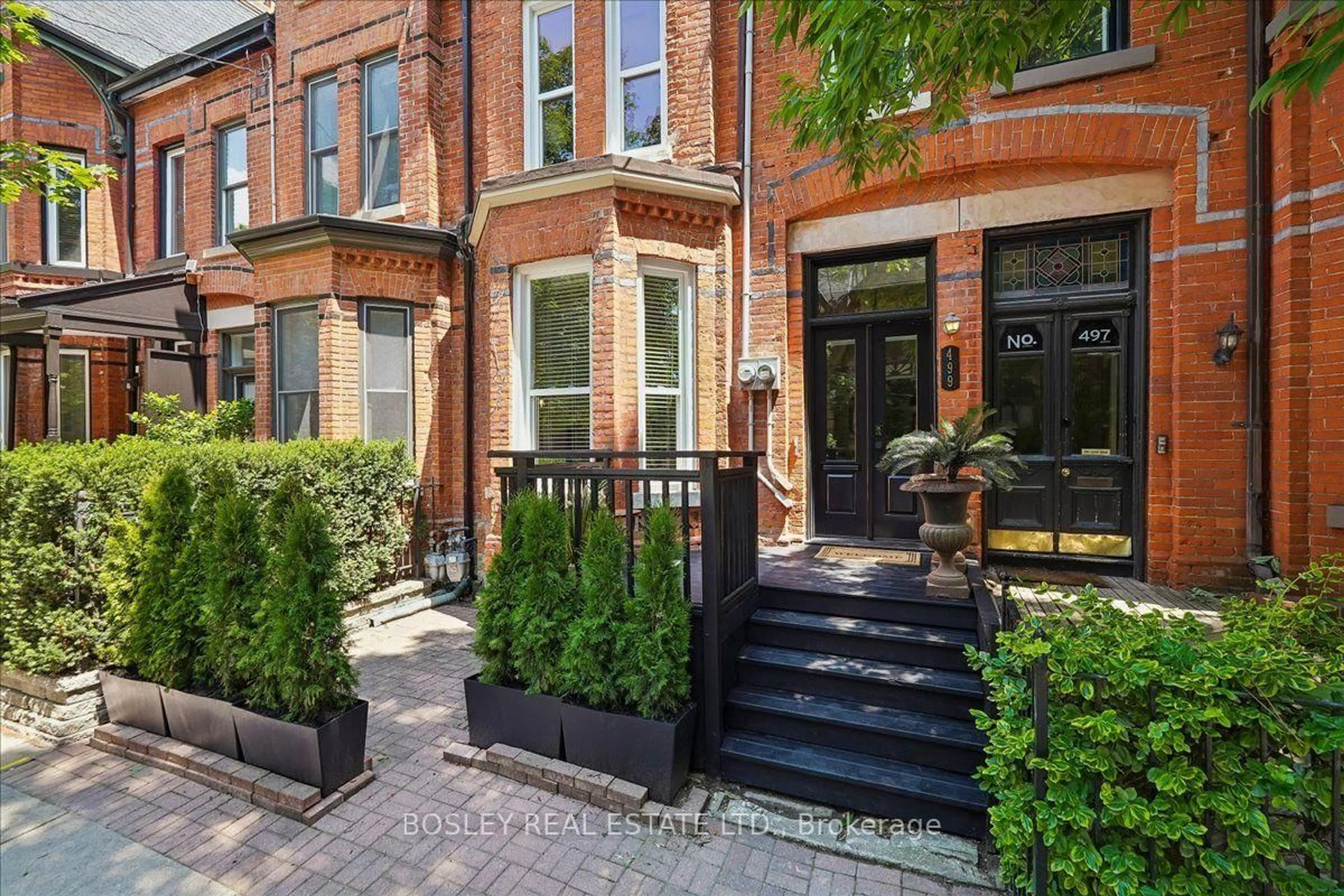 Home with brick exterior material, street for 499 Ontario St, Toronto Ontario M4X 1M7