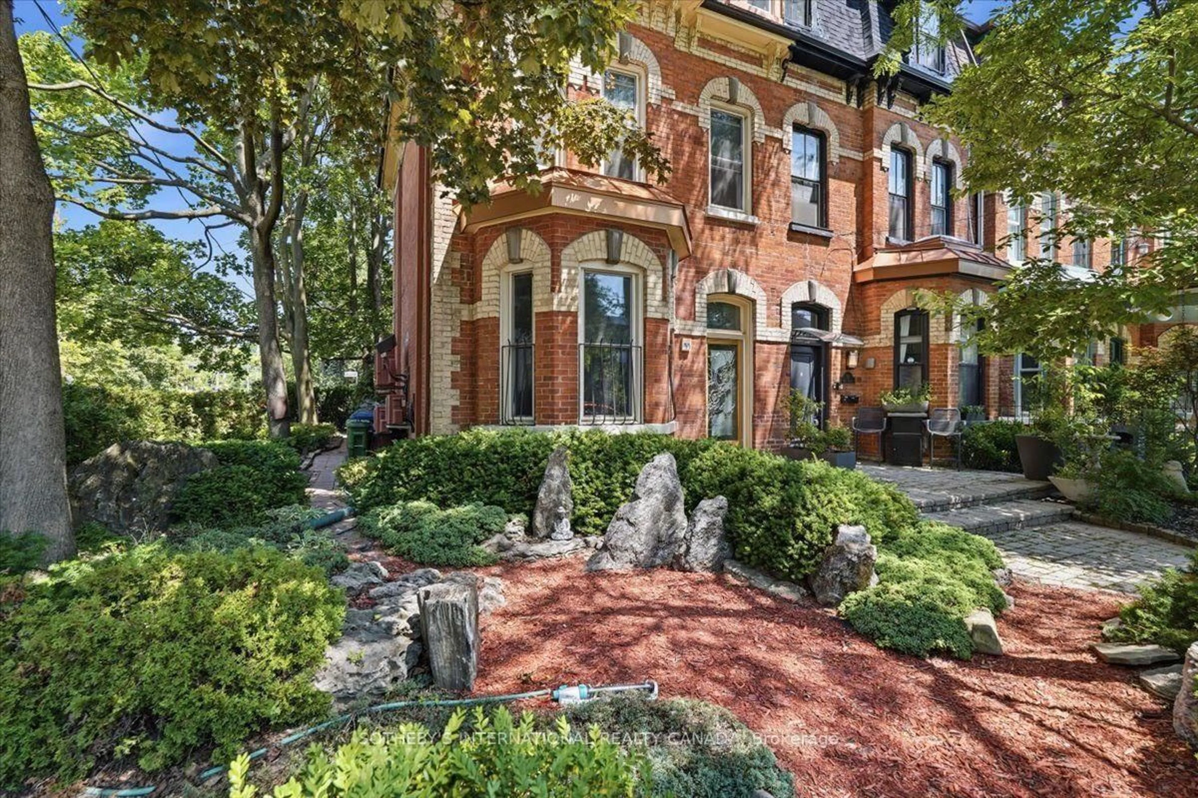 Home with brick exterior material, street for 33 Rose Ave, Toronto Ontario M4X 1N7