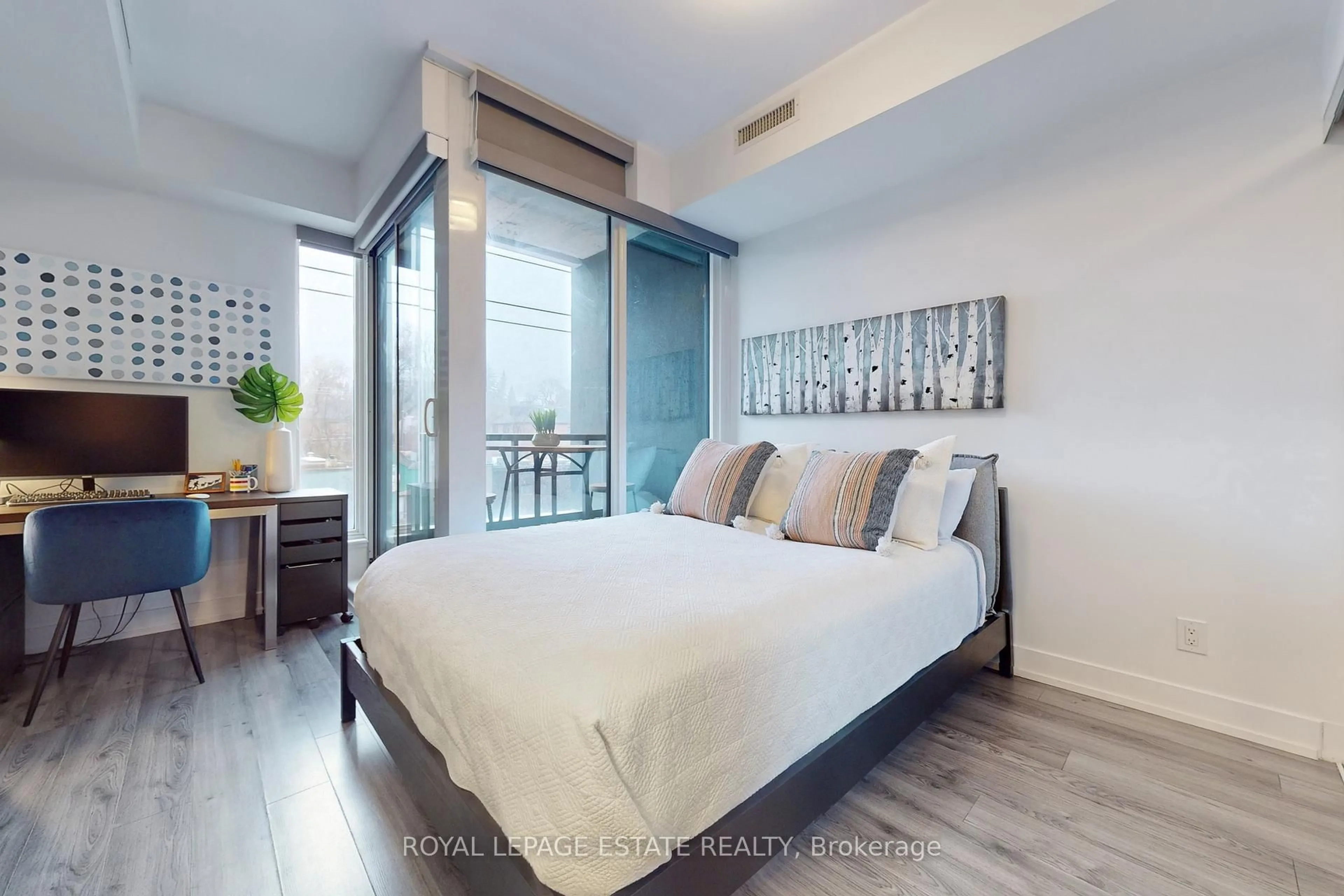 Bedroom with bed, wood/laminate floor for 170 Chiltern Hill Rd #306, Toronto Ontario M6C 0A9