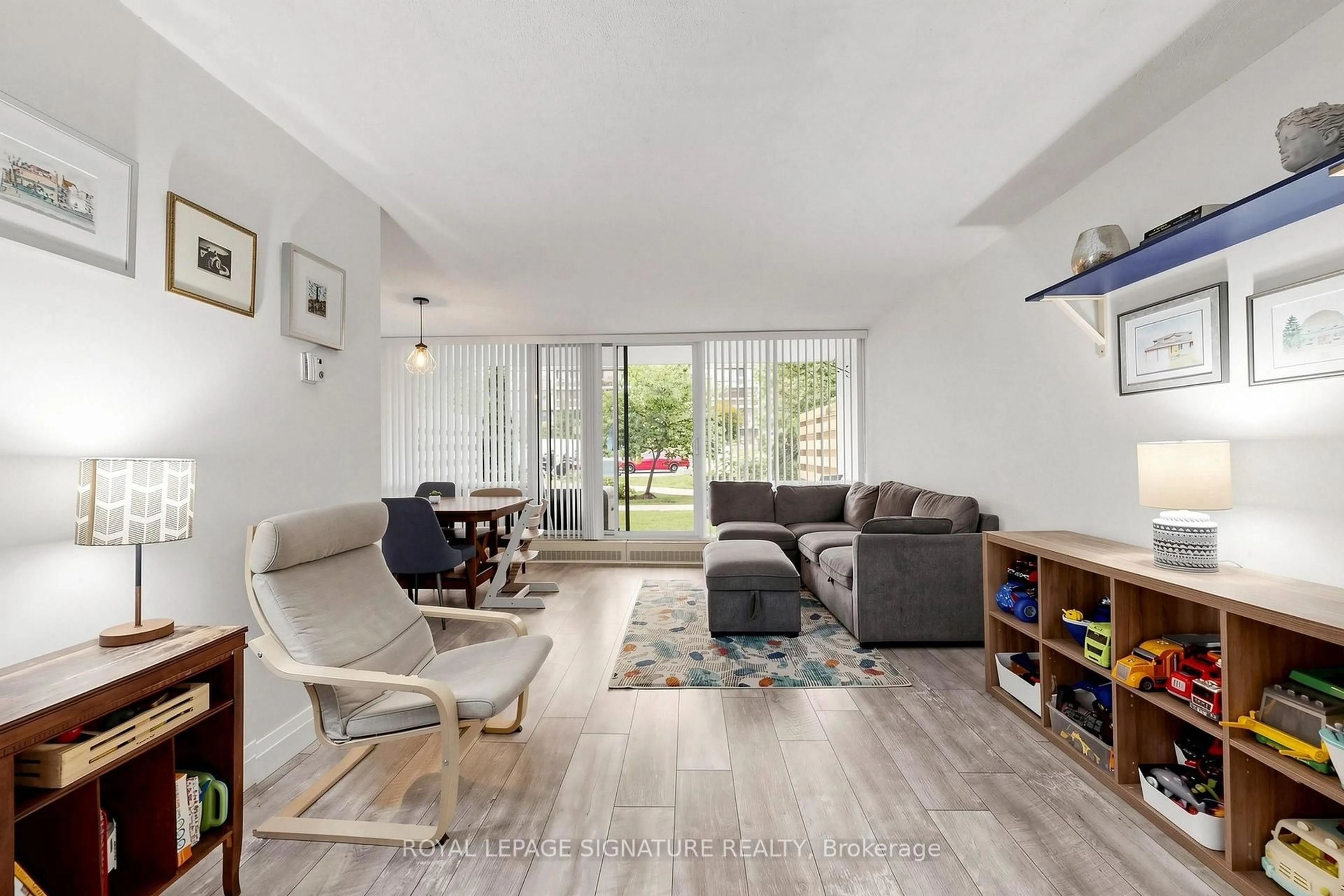 Living room with furniture, unknown for 1801 O'Connor Dr #116, Toronto Ontario M4A 2P8