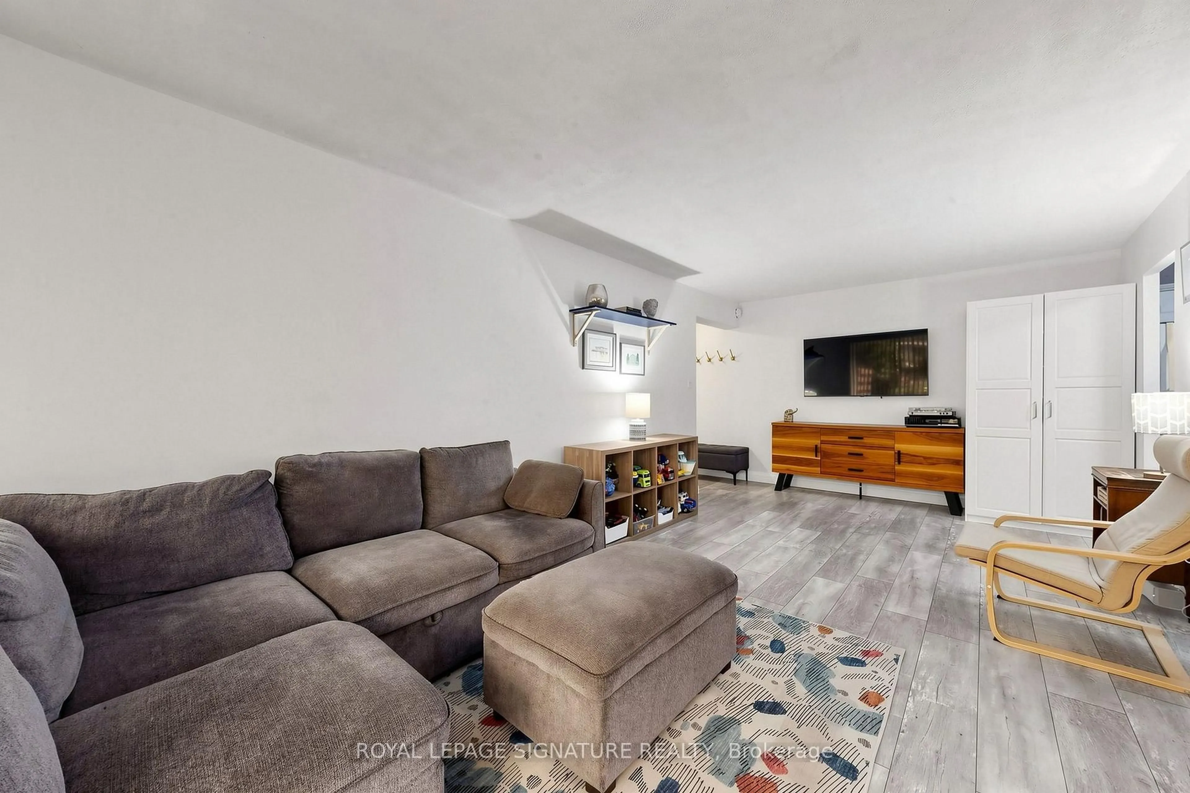 Living room with furniture, unknown for 1801 O'Connor Dr #116, Toronto Ontario M4A 2P8