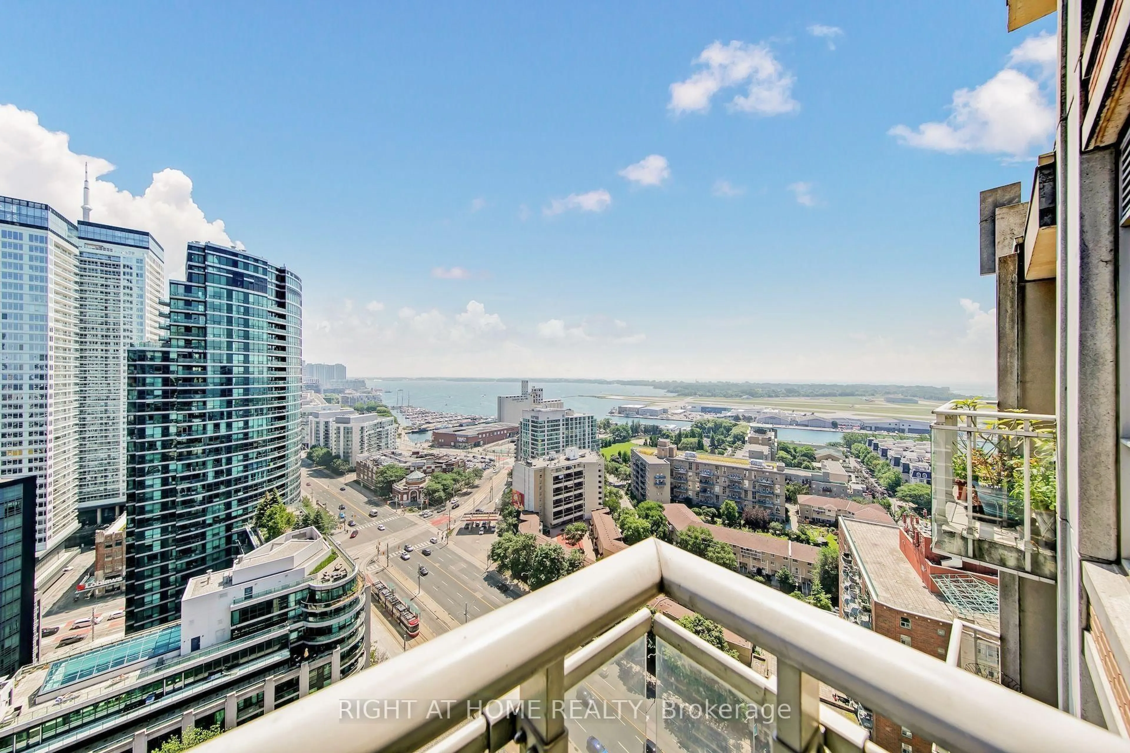 Balcony in the apartment, city buildings view from balcony for 21 GRAND MAGAZINE St #2409, Toronto Ontario M5V 1B5