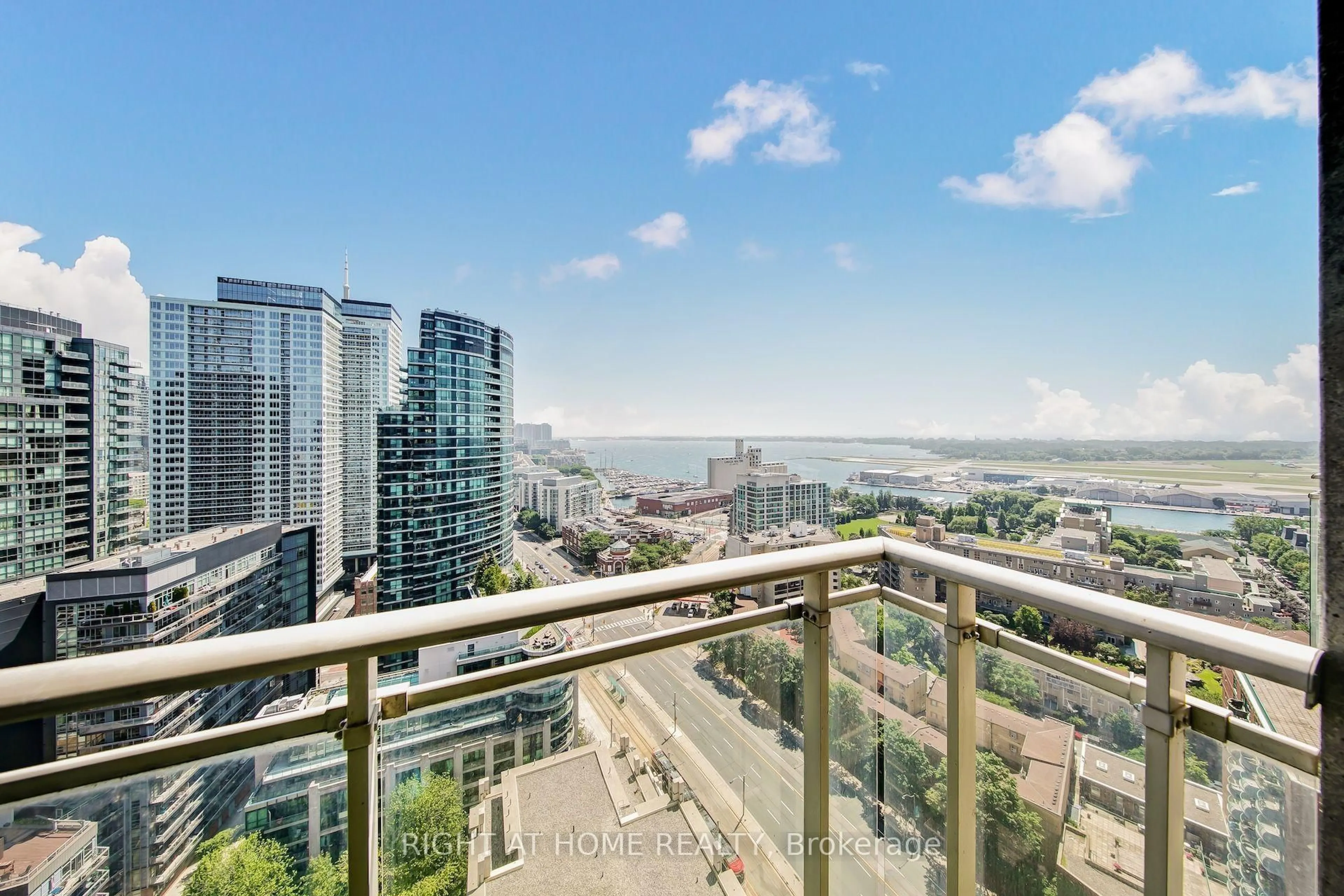 Balcony in the apartment, city buildings view from balcony for 21 GRAND MAGAZINE St #2409, Toronto Ontario M5V 1B5