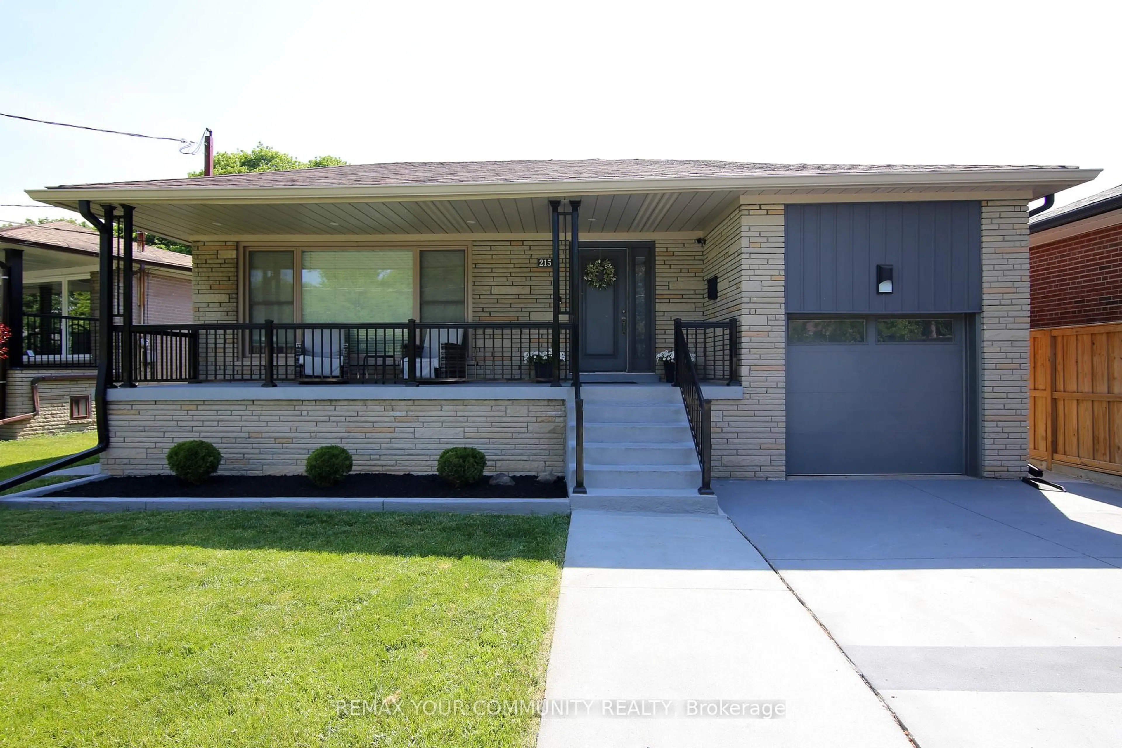 Home with vinyl exterior material, street for 215 Honiton St, Toronto Ontario M3H 5N7