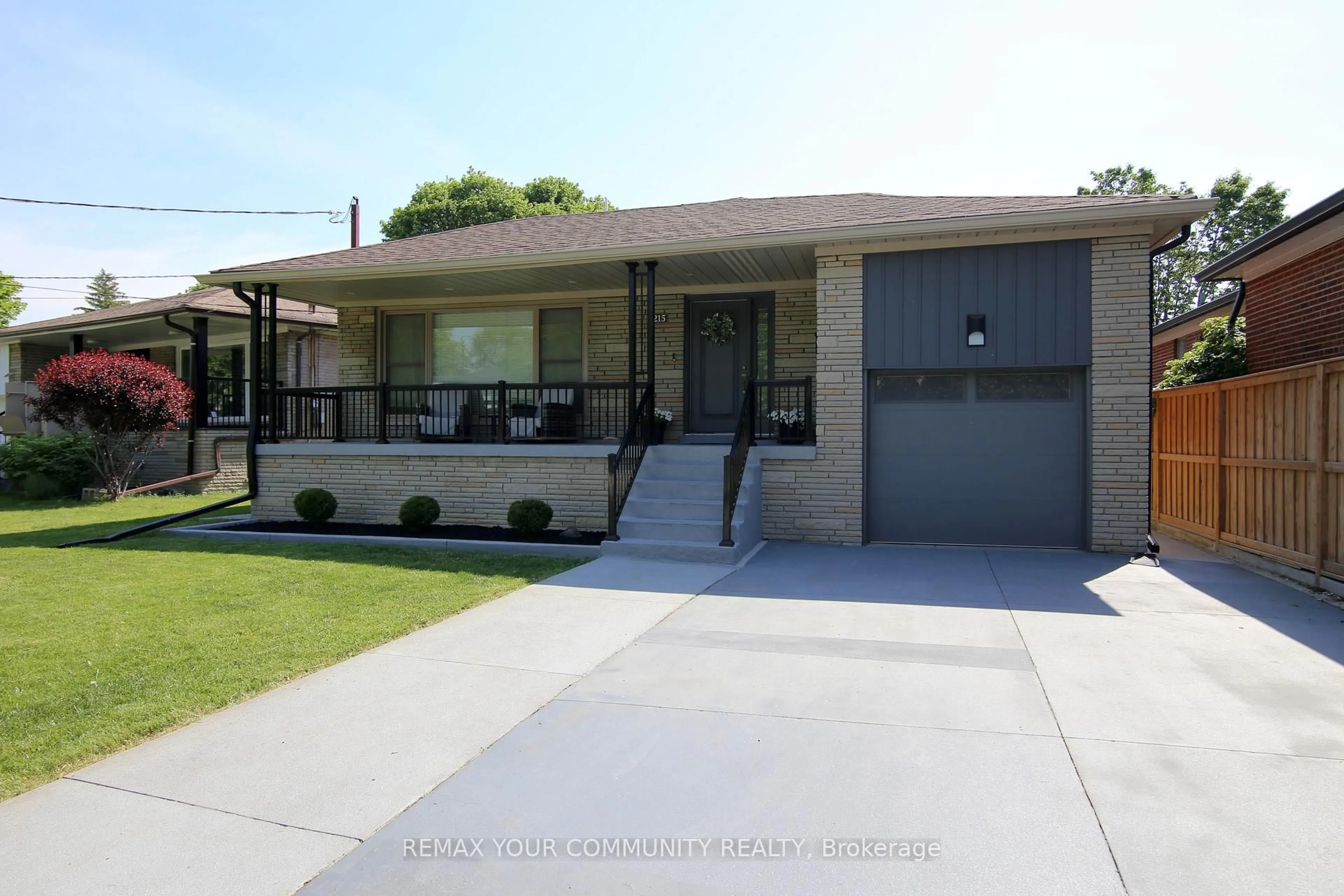 Home with vinyl exterior material, street for 215 Honiton St, Toronto Ontario M3H 5N7