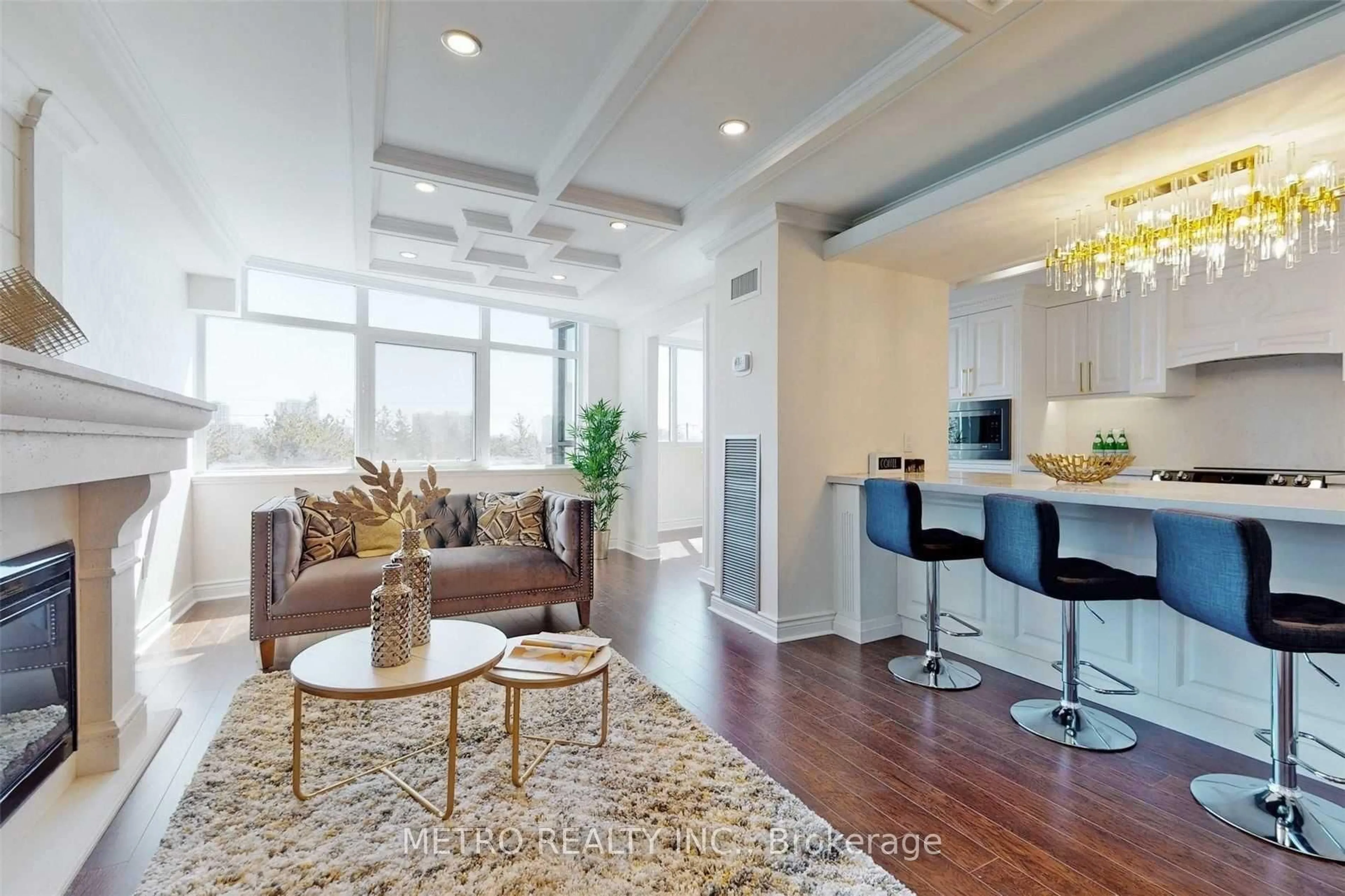 Living room with furniture, wood/laminate floor for 90 Fisherville Rd #406, Toronto Ontario M2R 3J9