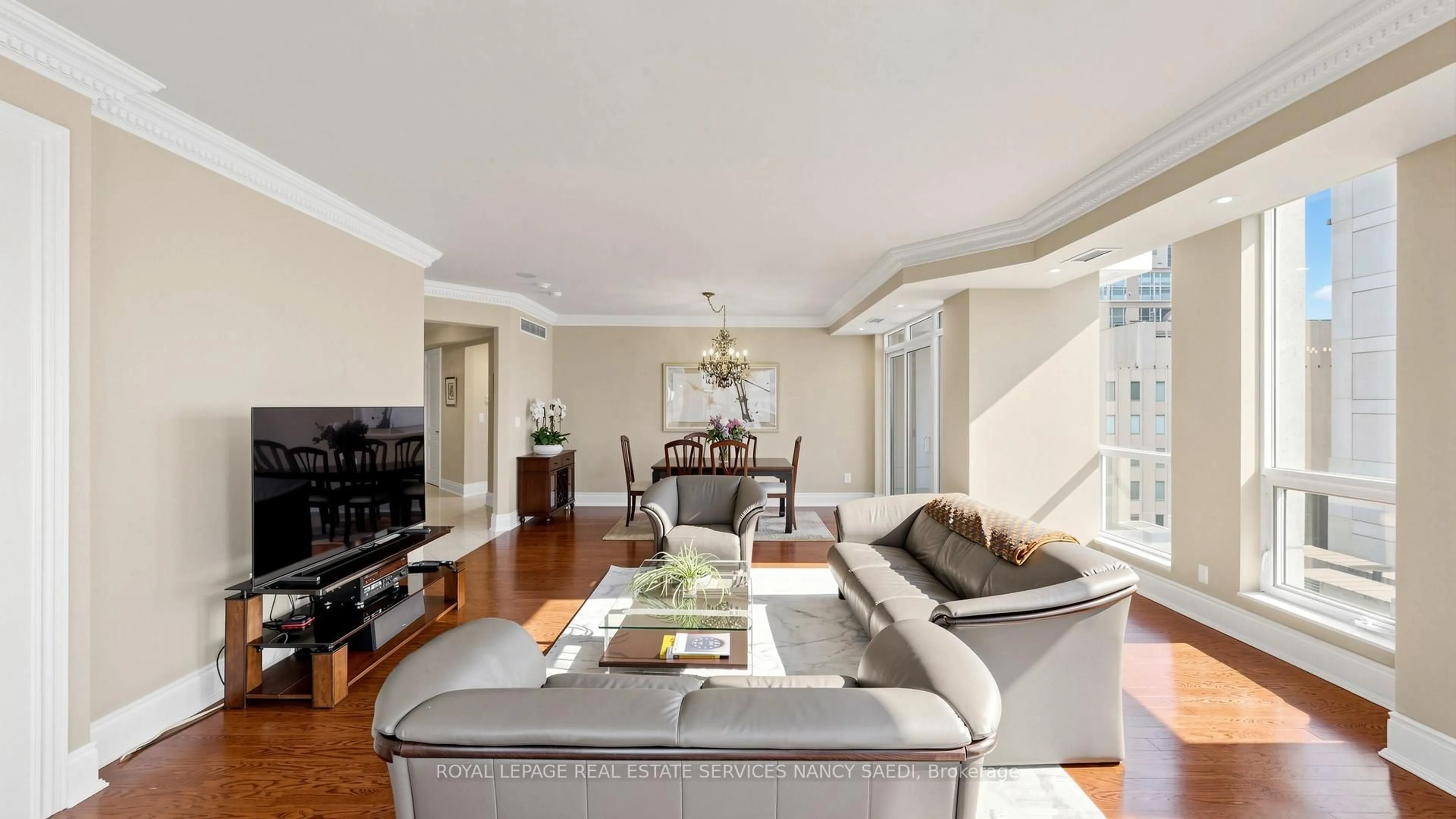 Living room with furniture, wood/laminate floor for 10 Bellair St #802, Toronto Ontario M5R 3T8