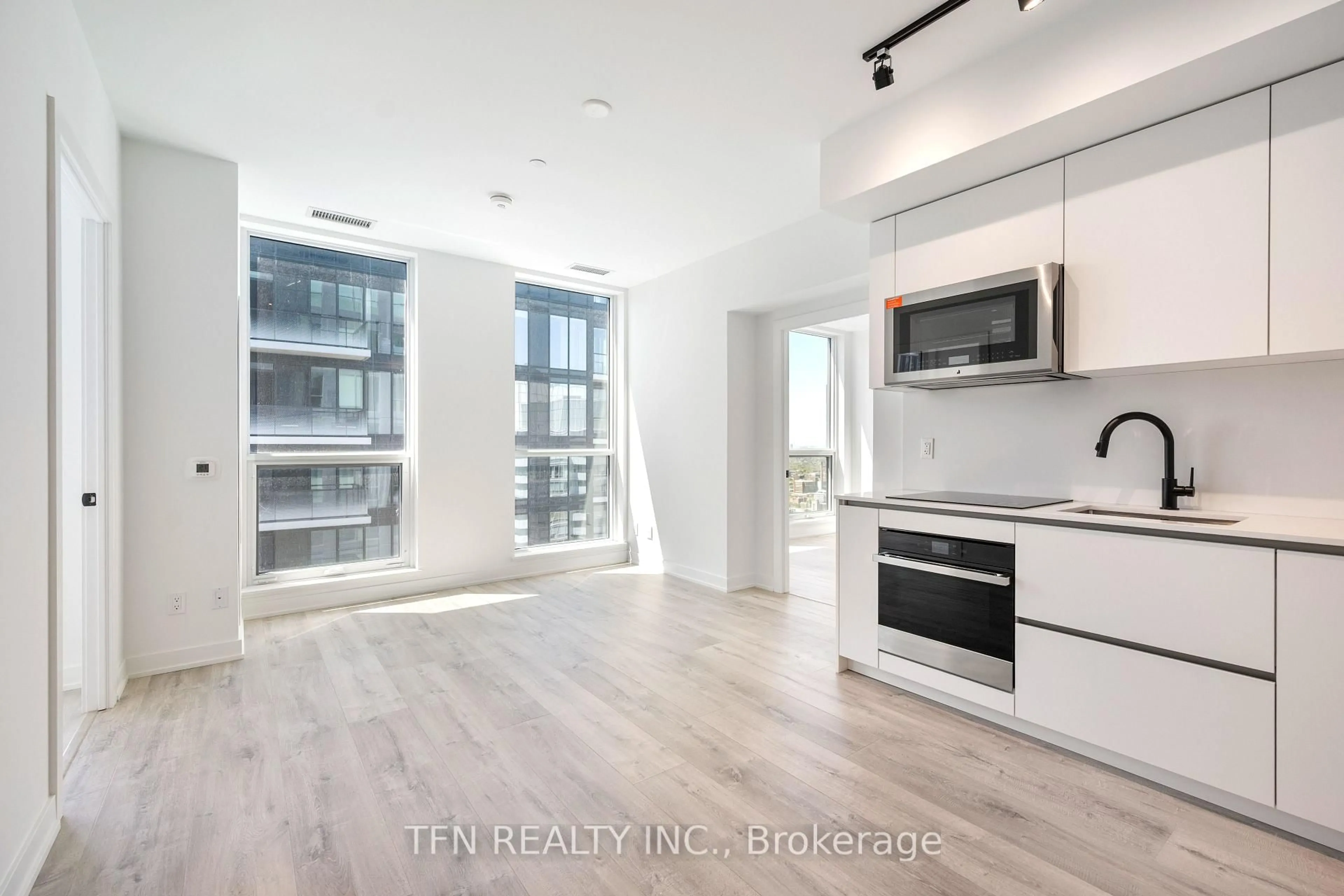 Open concept kitchen, unknown for 327 King St #4704, Toronto Ontario M5A 0Y5