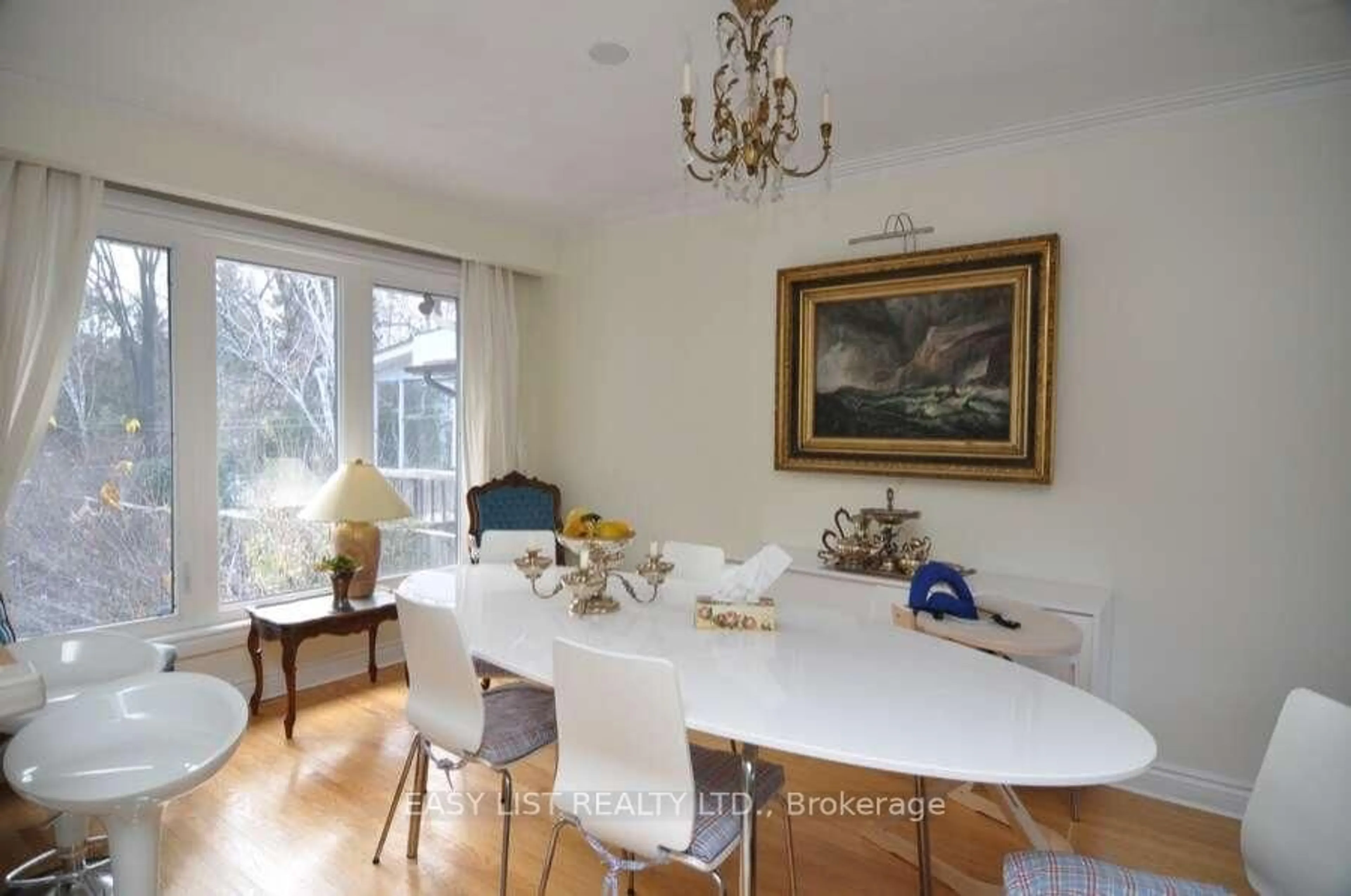 Dining room, wood/laminate floor for 43 Churchill Ave, Toronto Ontario M6J 2B5