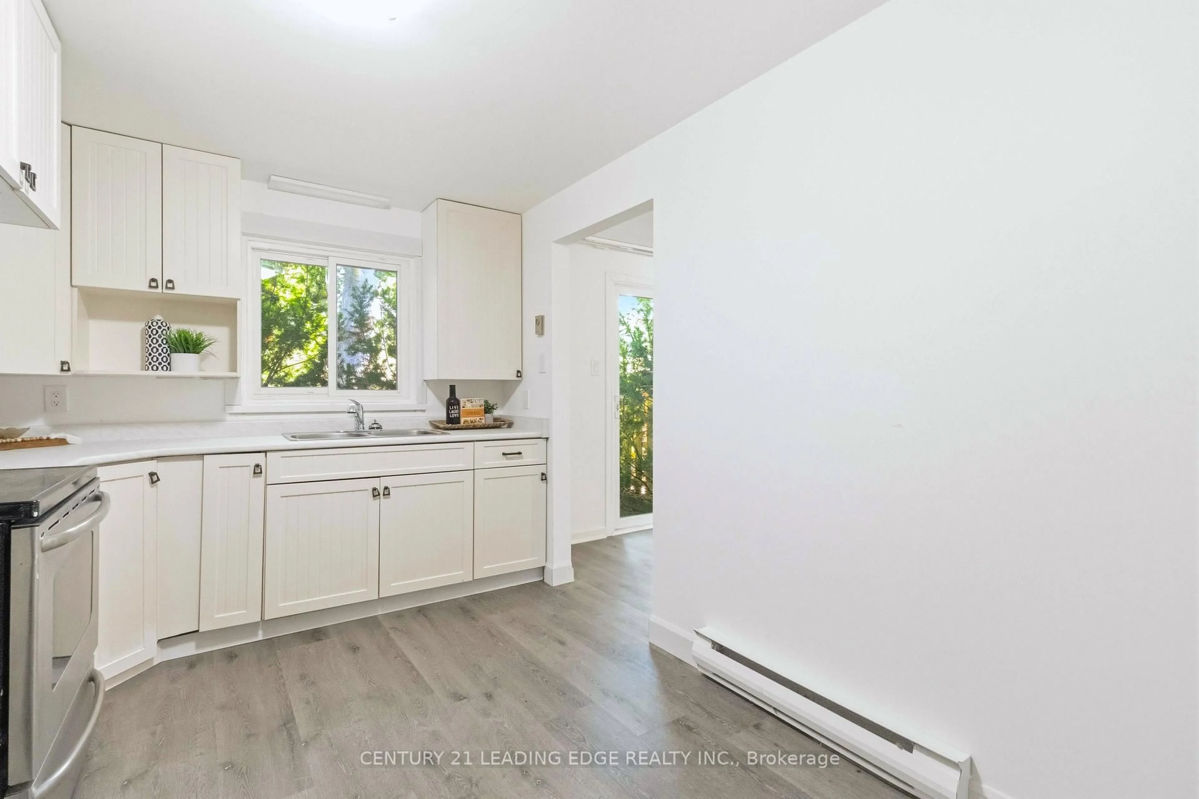Open concept kitchen, unknown for 27 Coach Liteway, Toronto Ontario M2R 3J8