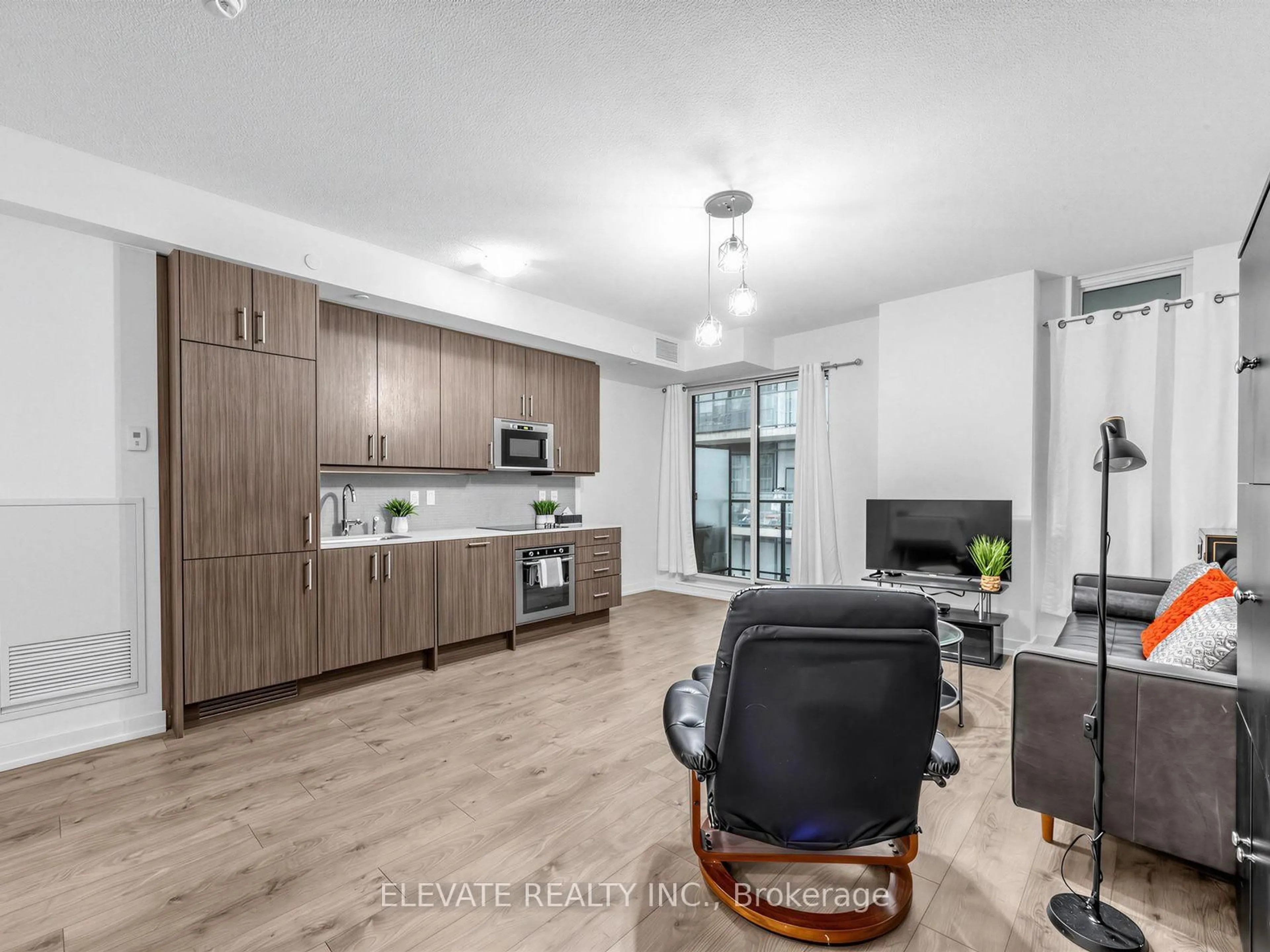 Open concept kitchen, wood/laminate floor for 297 College St #926, Toronto Ontario M5T 1S2