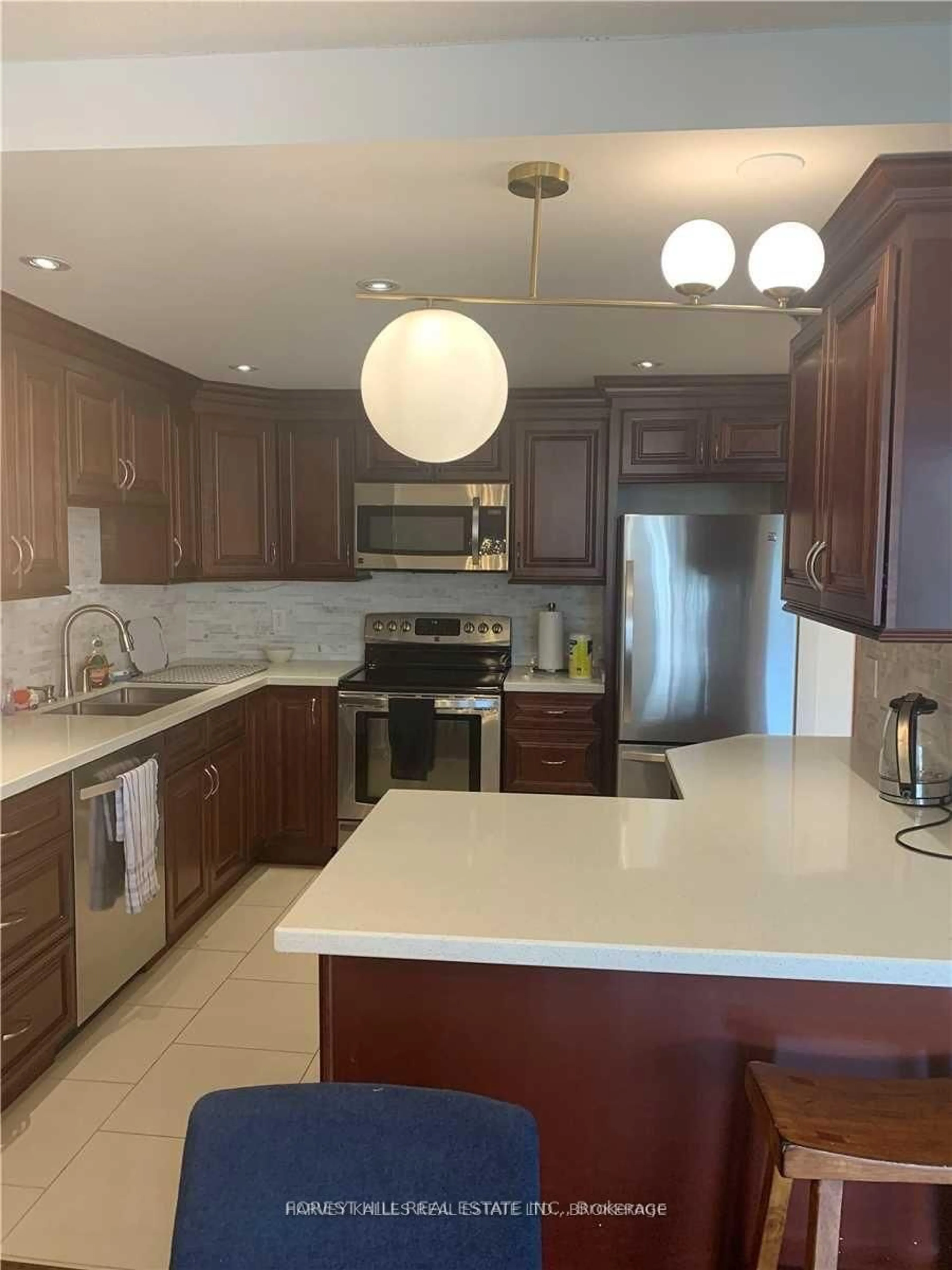 Open concept kitchen, ceramic/tile floor for 500 Glencairn Ave #303, Toronto Ontario M6B 1Z1