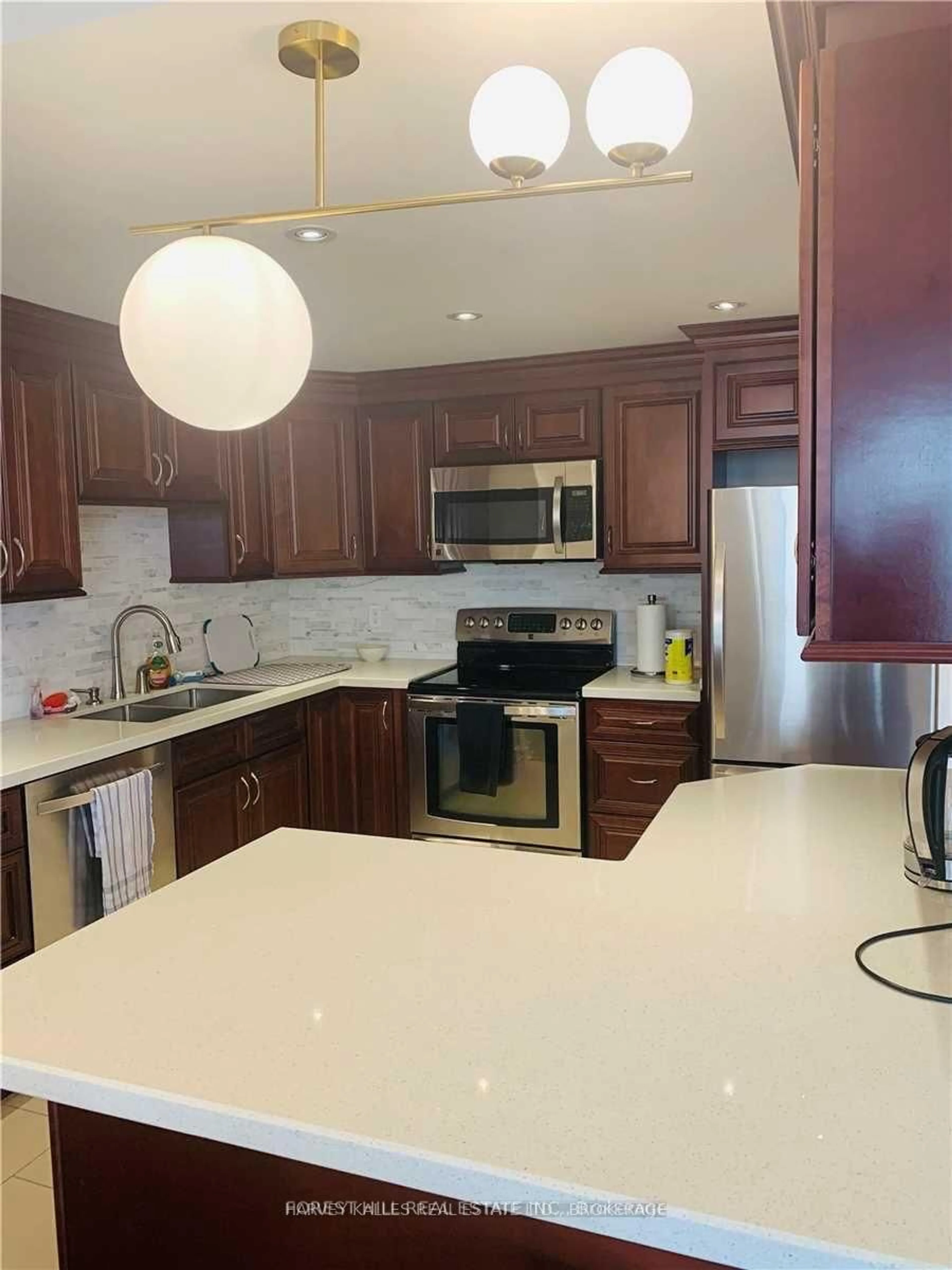 Open concept kitchen, ceramic/tile floor for 500 Glencairn Ave #303, Toronto Ontario M6B 1Z1