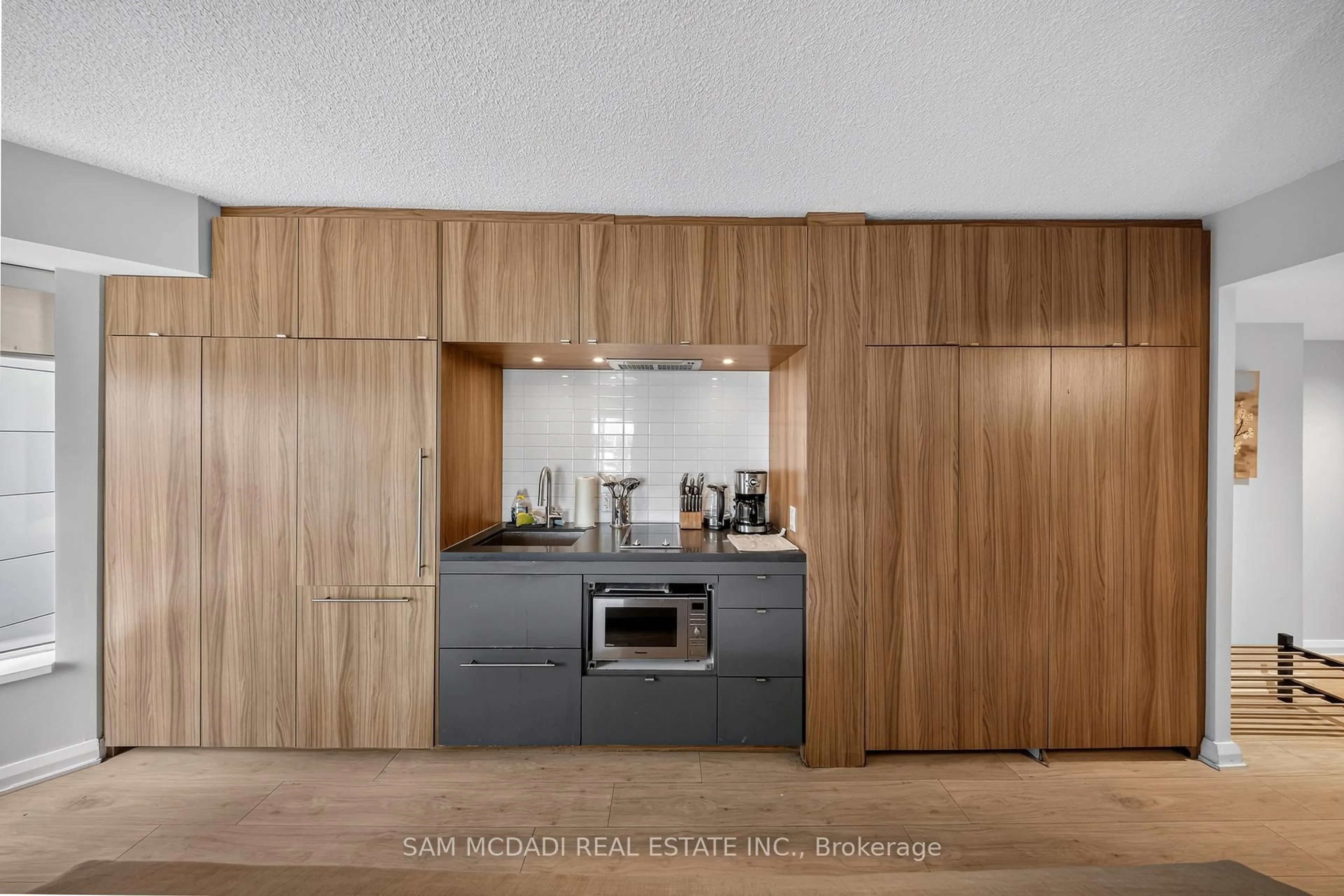 Contemporary kitchen, wood/laminate floor for 155 Yorkville Ave #704, Toronto Ontario M5R 0B4