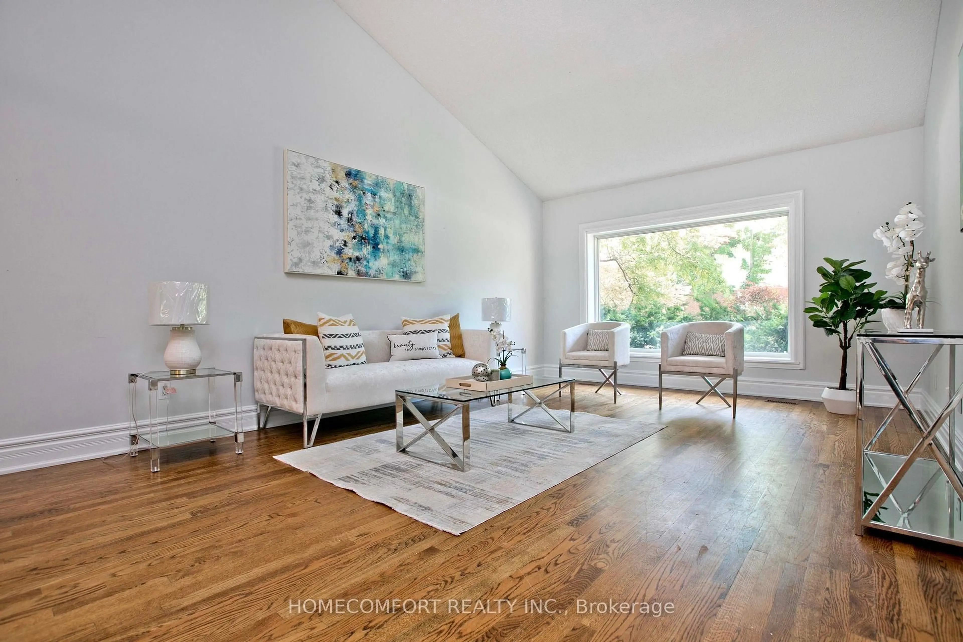 Living room with furniture, wood/laminate floor for 17 Bramble Dr, Toronto Ontario M3B 2E9