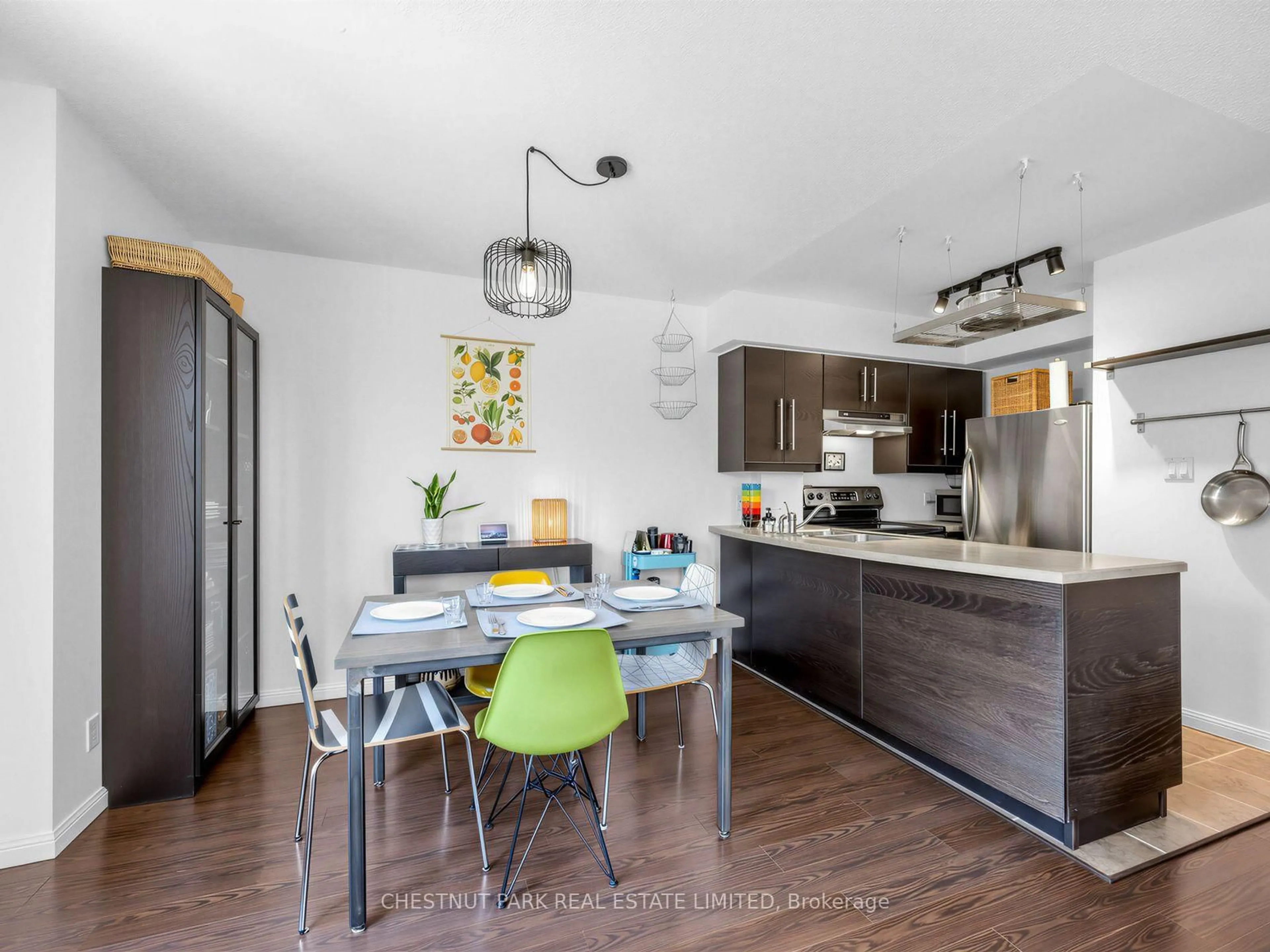 Open concept kitchen, wood/laminate floor for 26 Douro St #333, Toronto Ontario M6K 3M4
