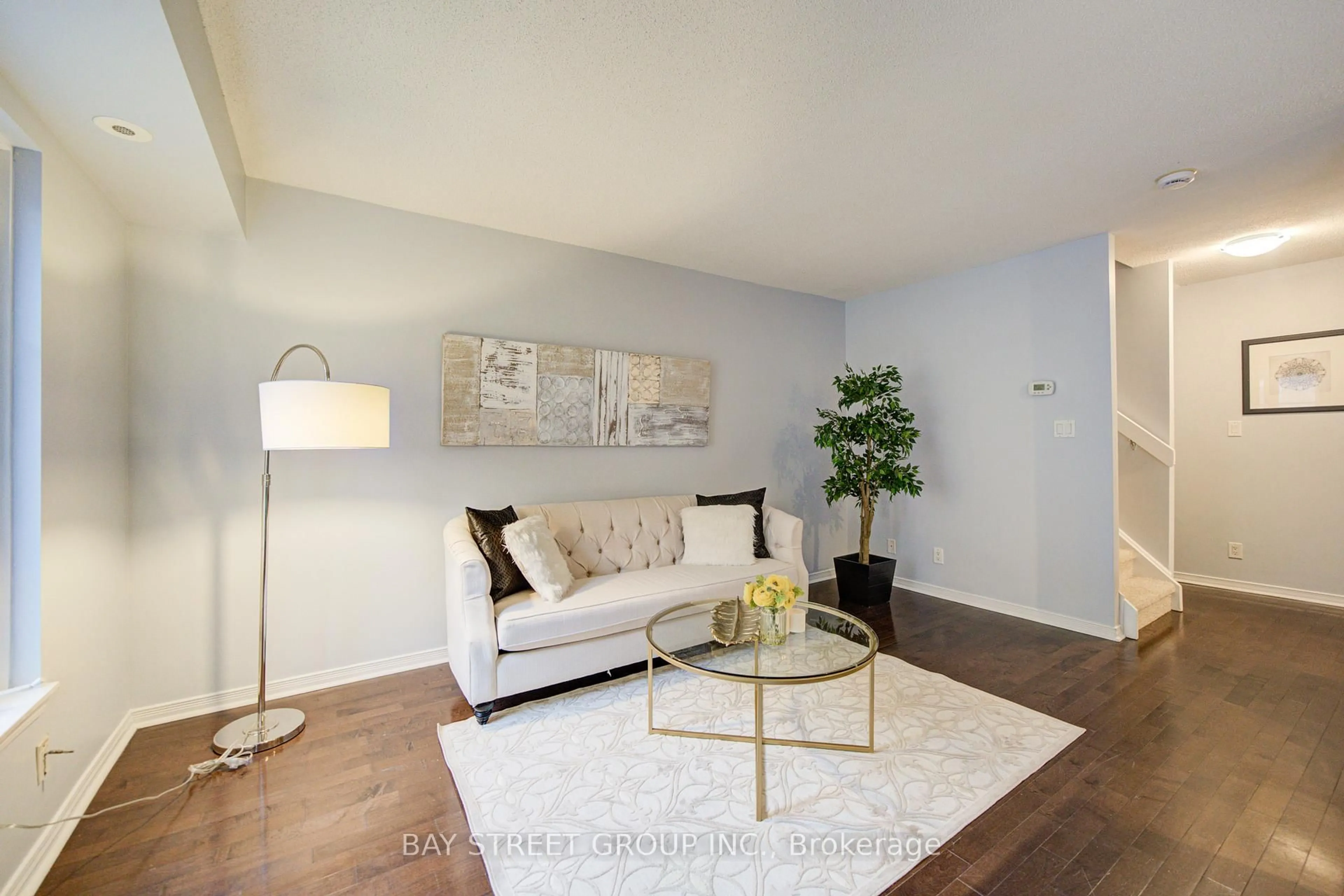 Living room with furniture, wood/laminate floor for 30 Western Battery Rd #333, Toronto Ontario M6K 3N9