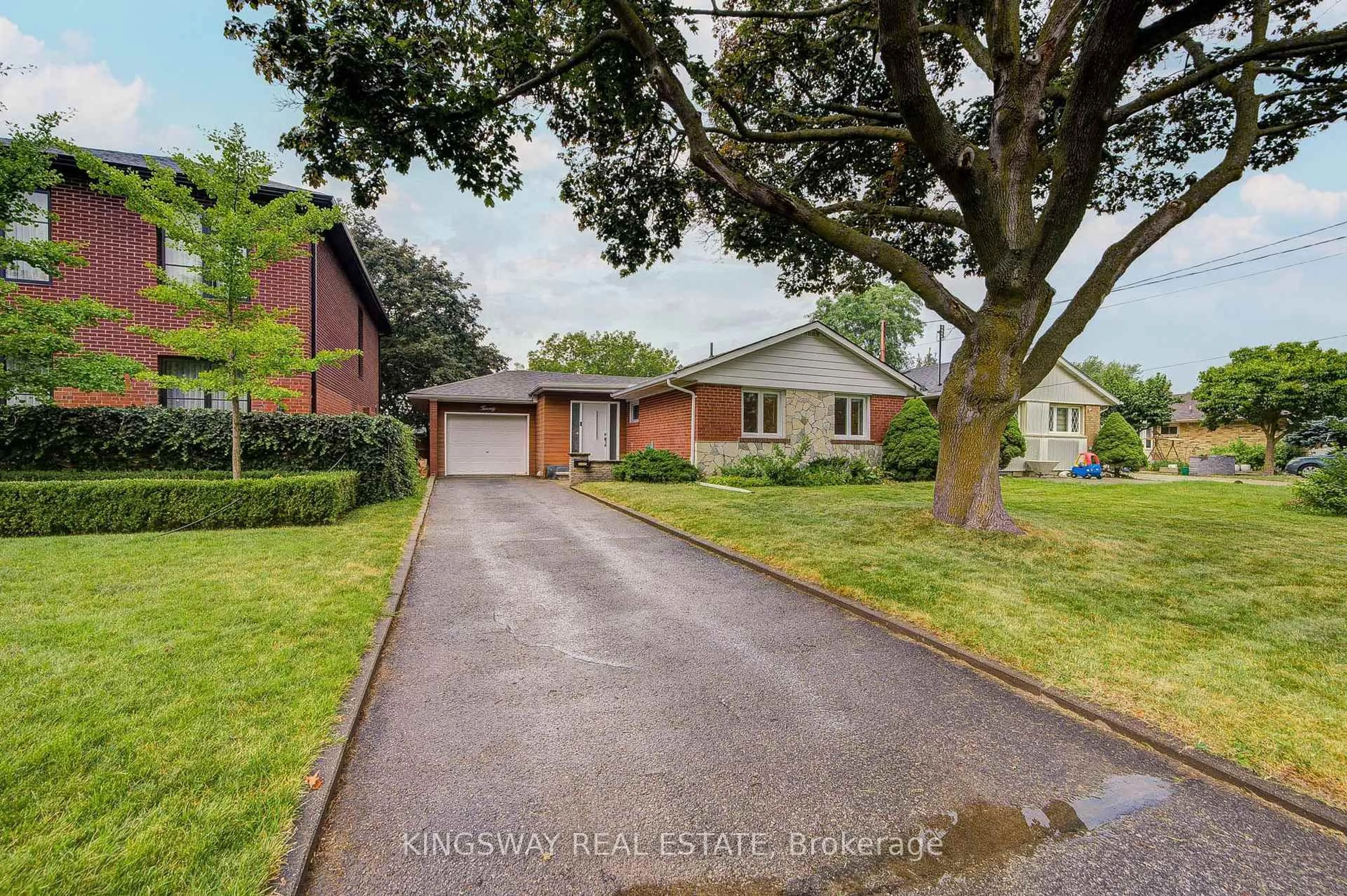 Home with brick exterior material, street for 20 Wigmore Dr, Toronto Ontario M4A 2E5