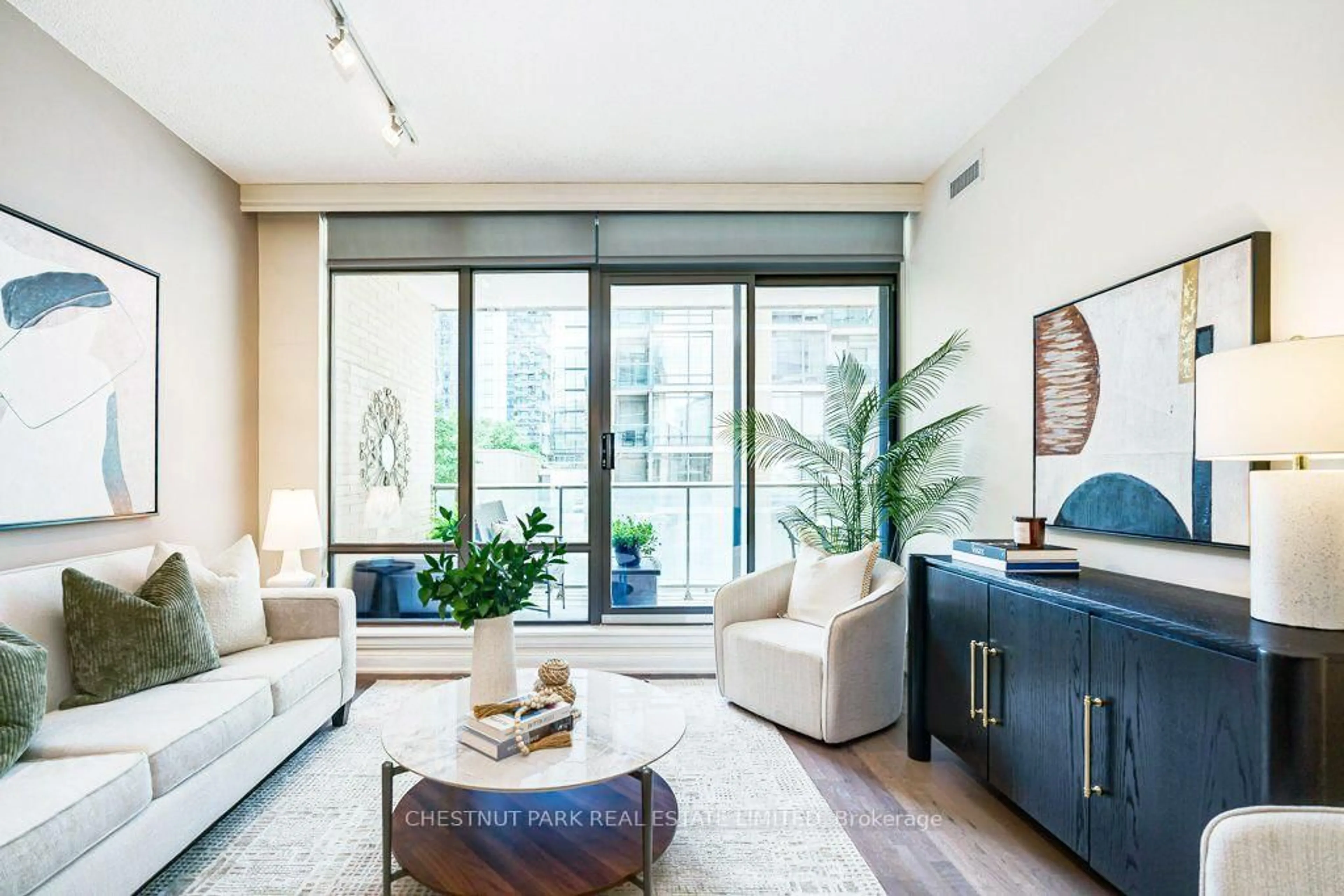 Living room with furniture, unknown for 18 Yorkville Ave #210, Toronto Ontario M4W 3Y8