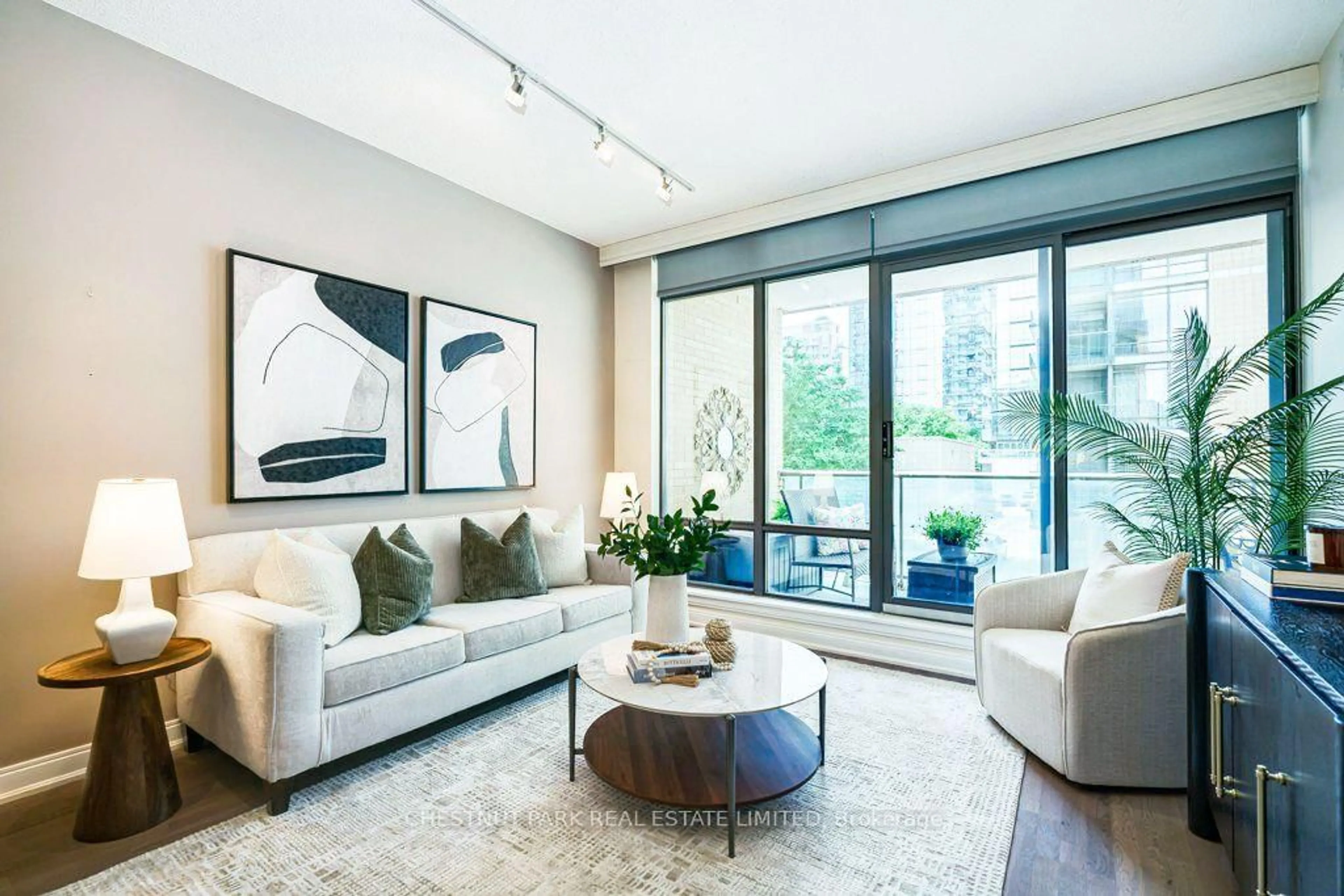 Living room with furniture, unknown for 18 Yorkville Ave #210, Toronto Ontario M4W 3Y8