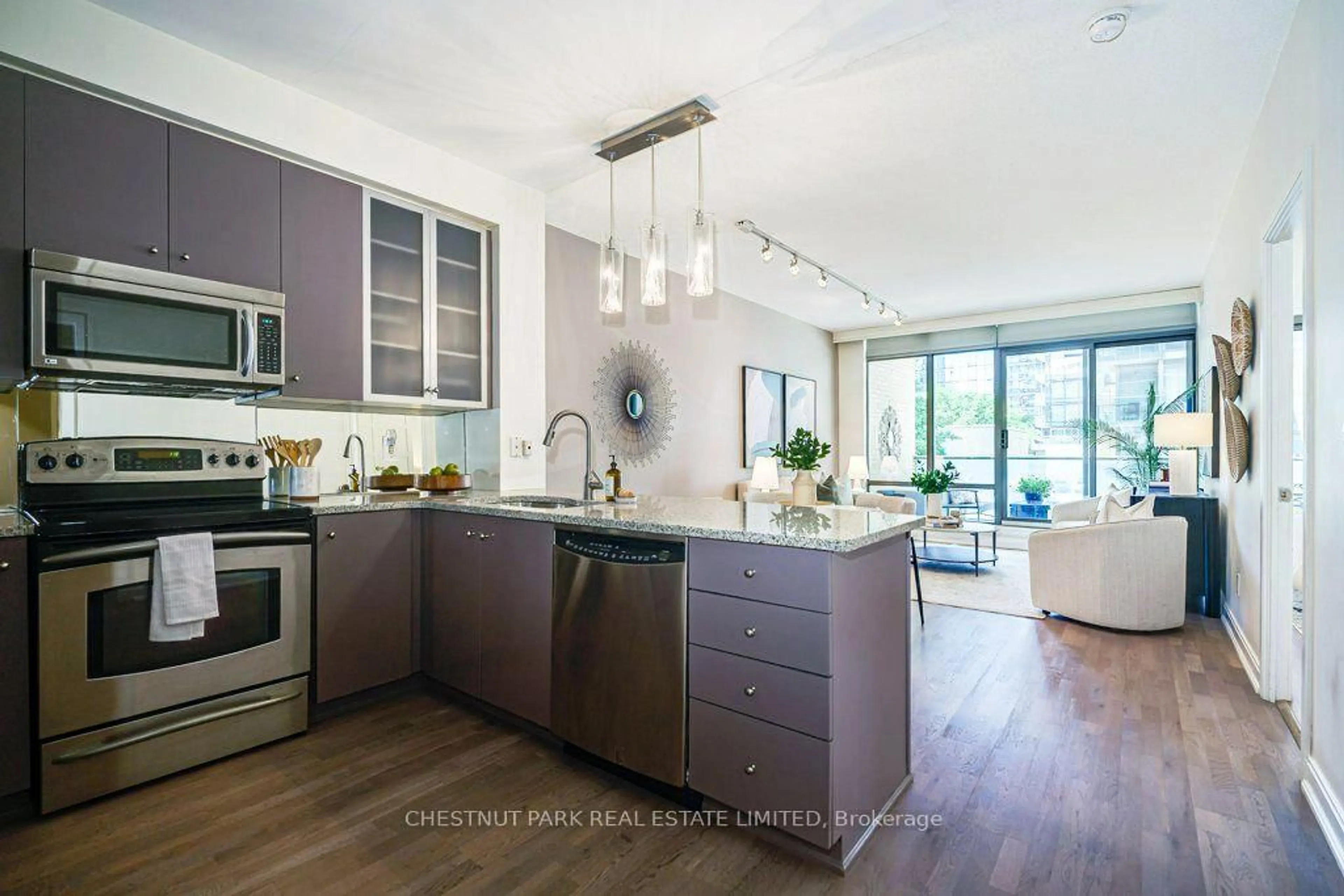 Open concept kitchen, ceramic/tile floor for 18 Yorkville Ave #210, Toronto Ontario M4W 3Y8