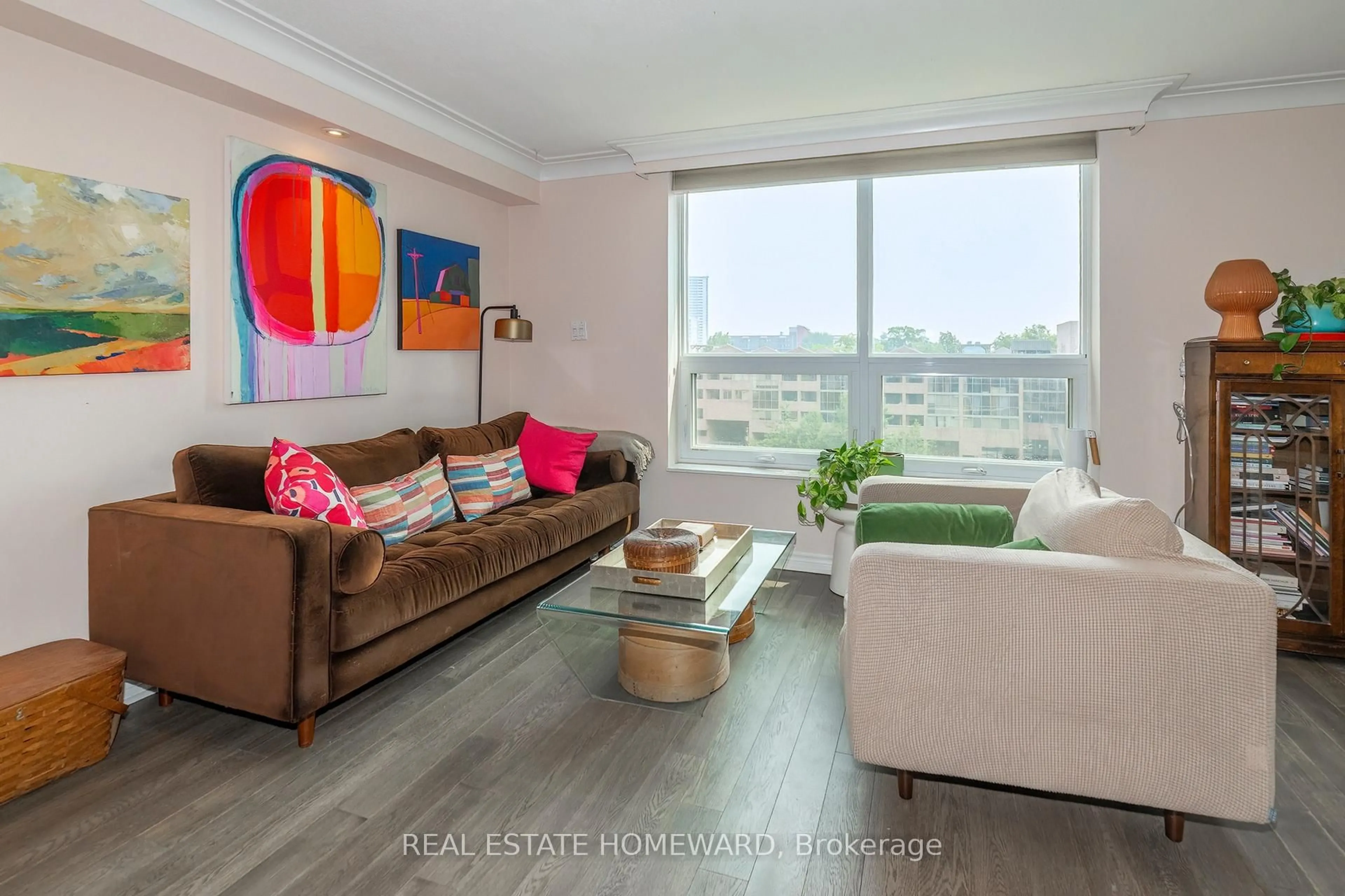 Living room with furniture, wood/laminate floor for 77 Maitland Pl #615, Toronto Ontario M4Y 2V6
