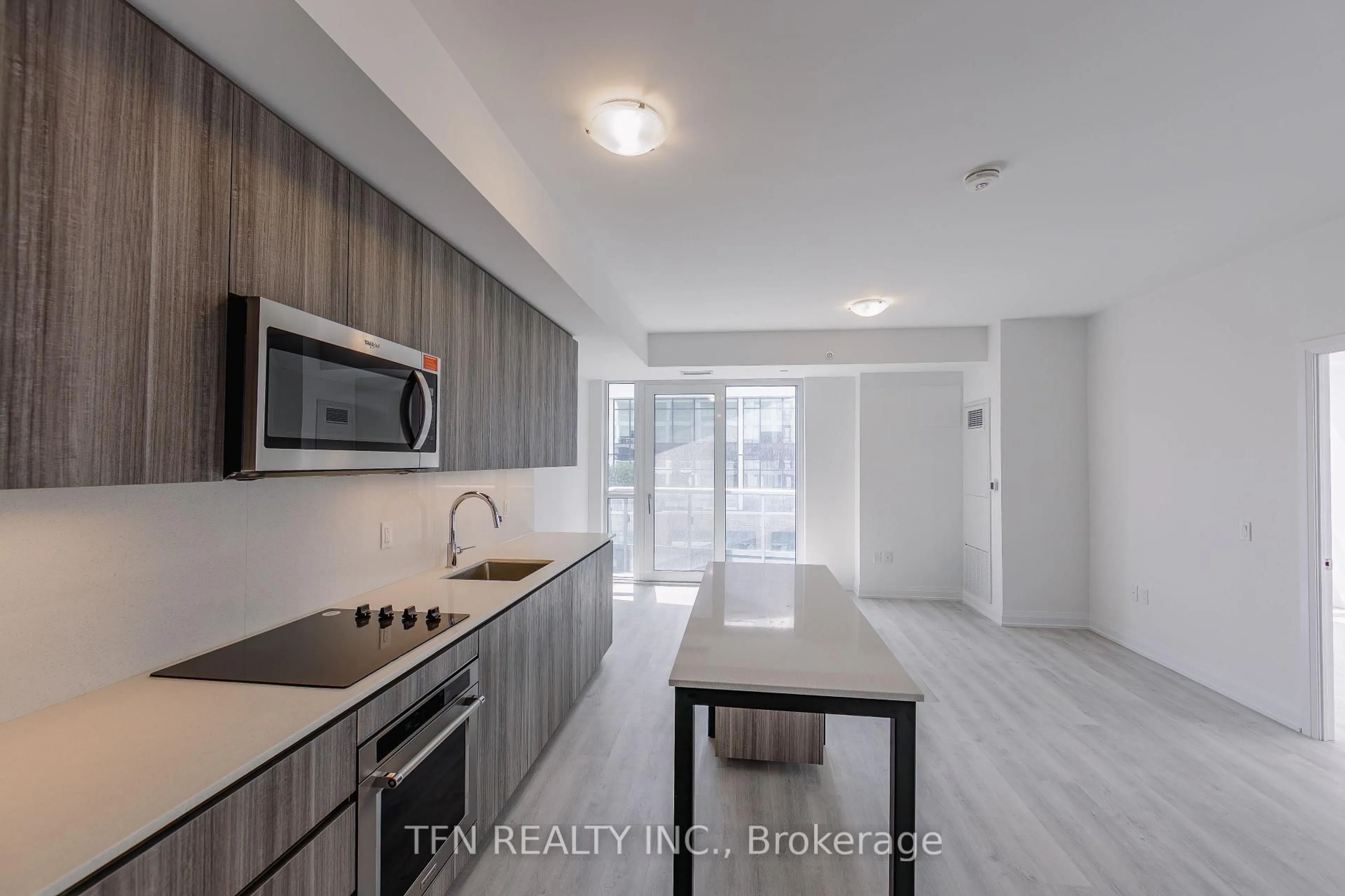 Open concept kitchen, ceramic/tile floor for 15 Richardson St #1318, Toronto Ontario M5A 0Y5