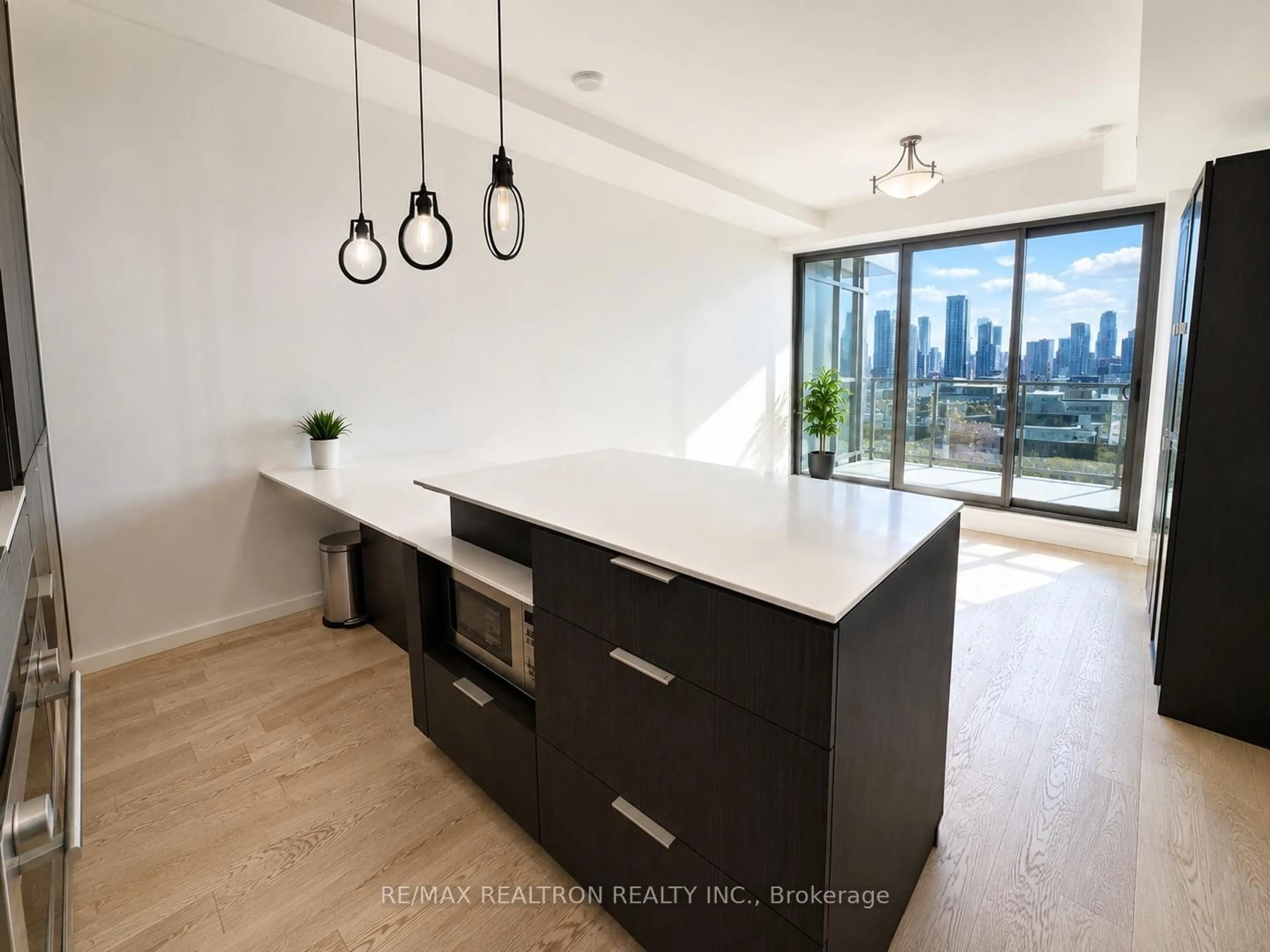 Open concept kitchen, wood/laminate floor for 5 St Joseph St #2001, Toronto Ontario M4Y 1J6