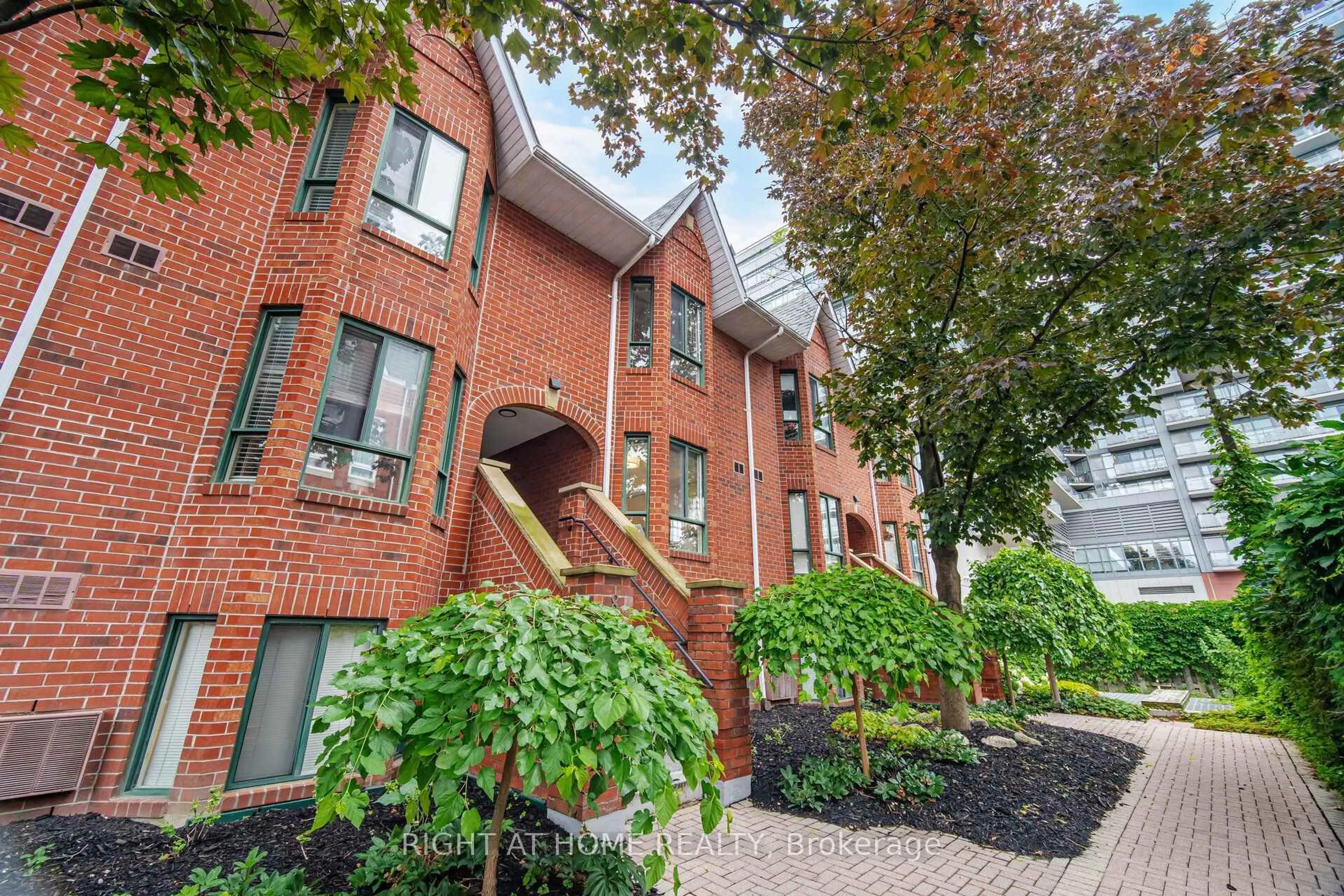 Home with brick exterior material, street for 801 King St #TH 8A, Toronto Ontario M5V 3C9