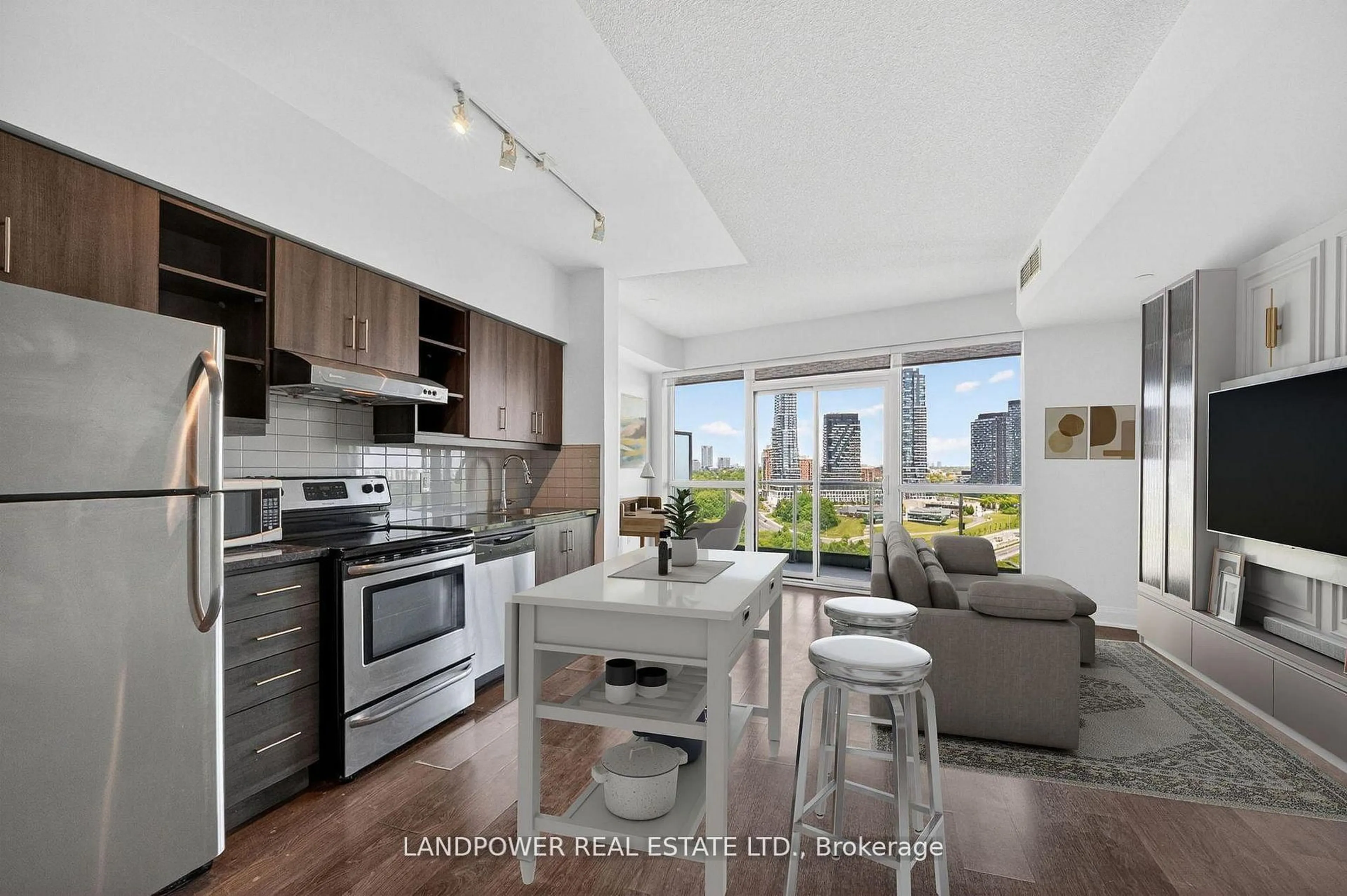 Open concept kitchen, wood/laminate floor for 160 Vanderhoof Ave #1203, Toronto Ontario M4G 0B7