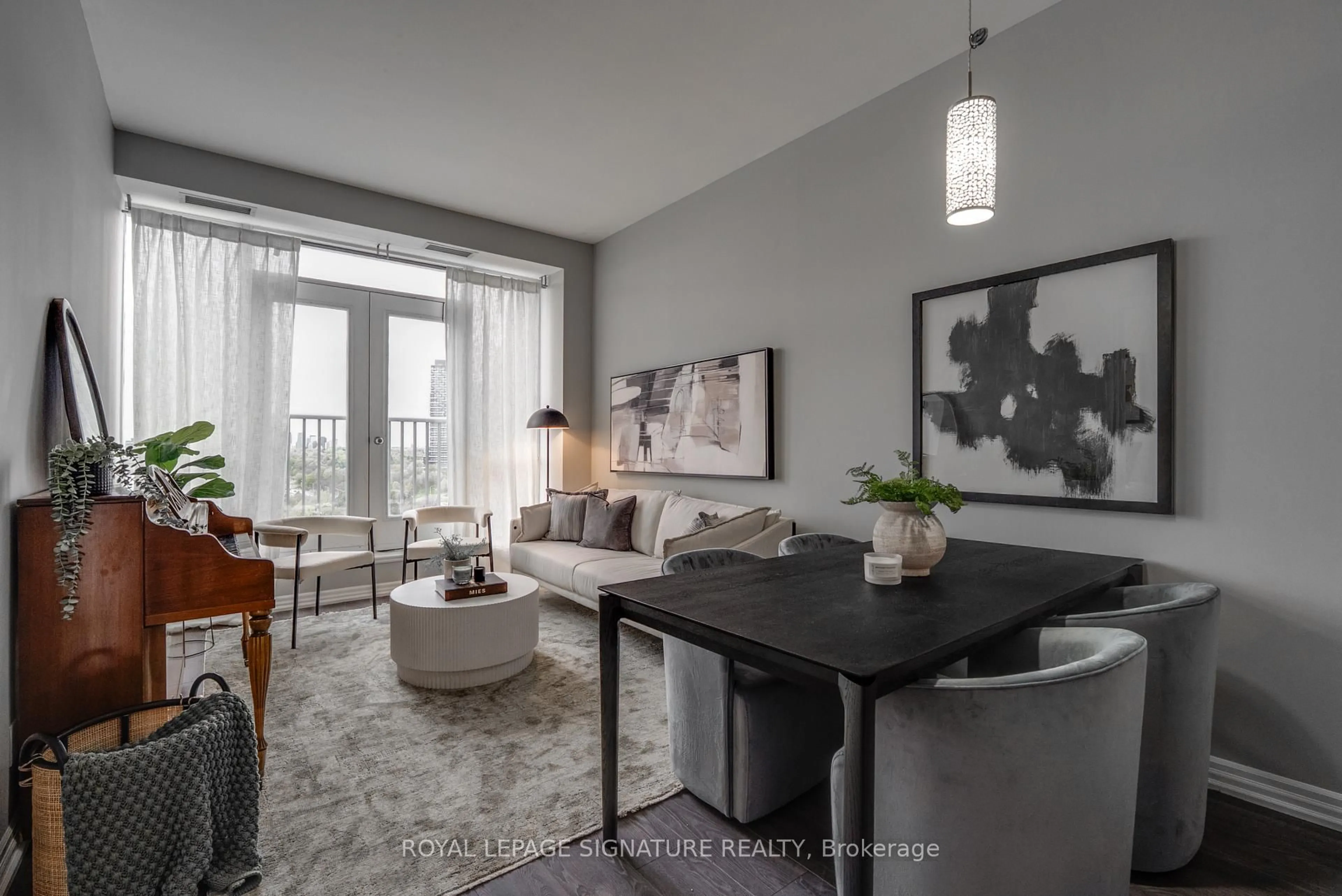 Living room with furniture, unknown for 797 Don Mills Rd #904, Toronto Ontario M3C 1V1