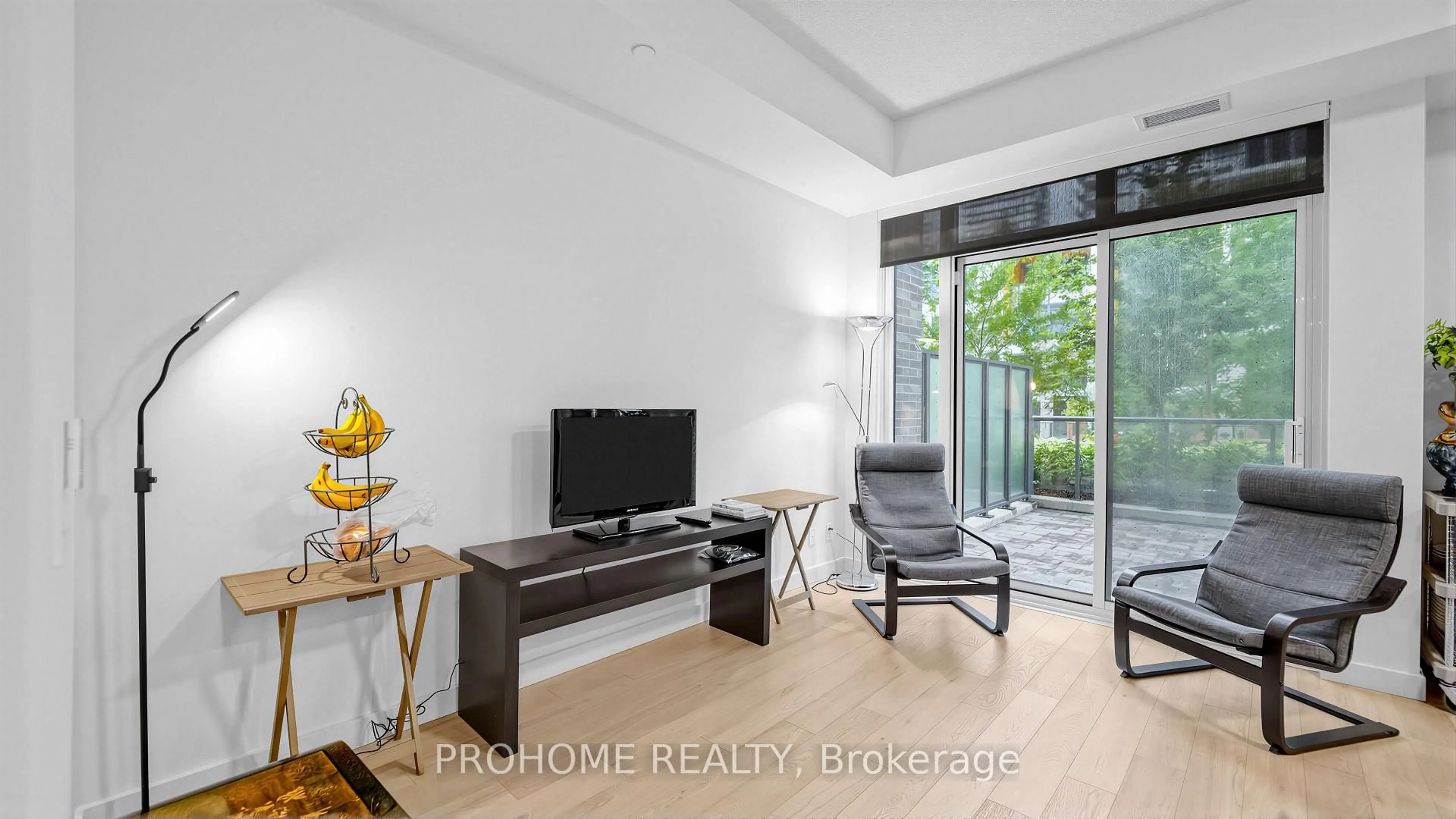 Living room with furniture, wood/laminate floor for 27 McMahon Dr #111, Toronto Ontario M2K 0J2