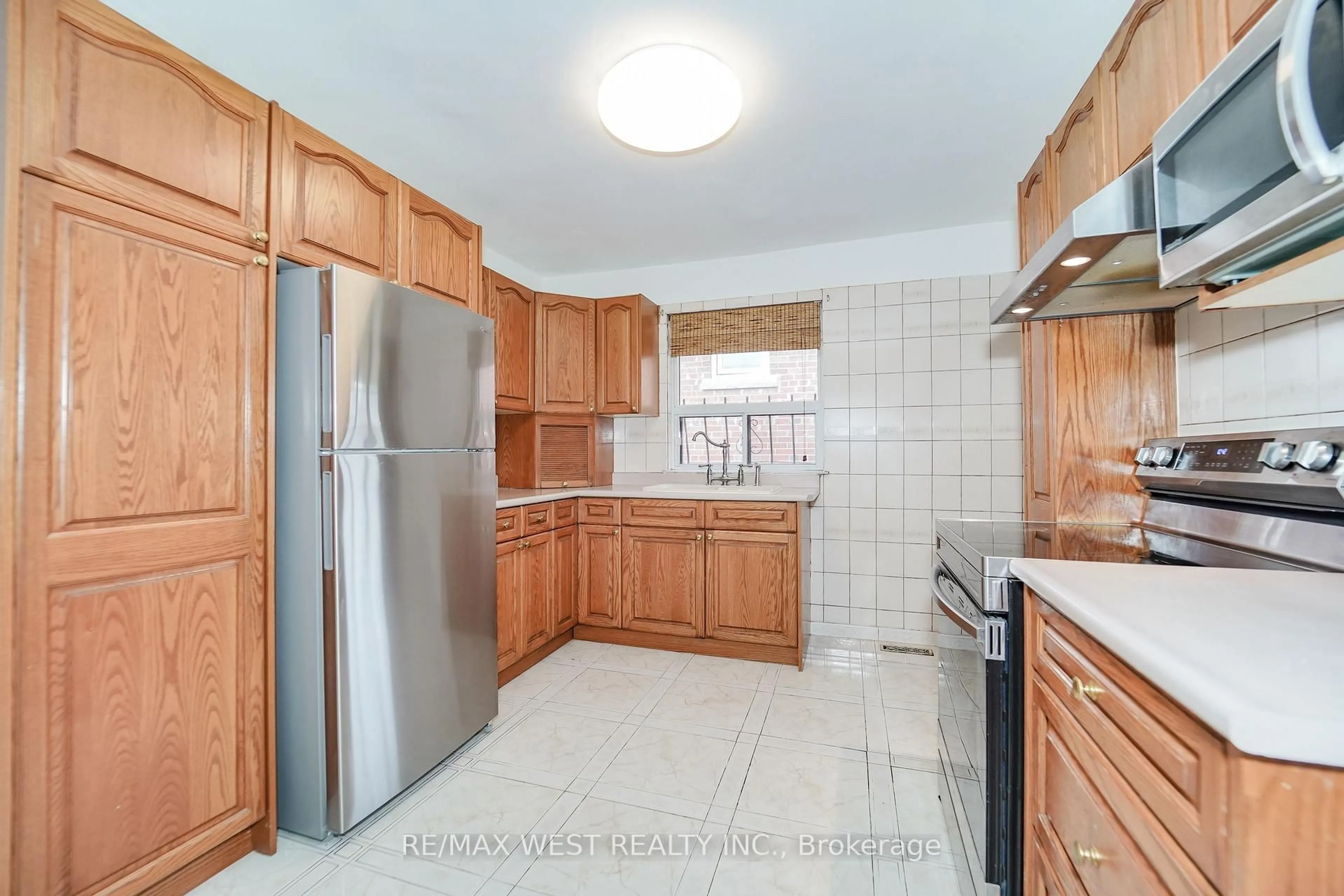 Standard kitchen, ceramic/tile floor for 14 Model Ave, Toronto Ontario M3H 1W1