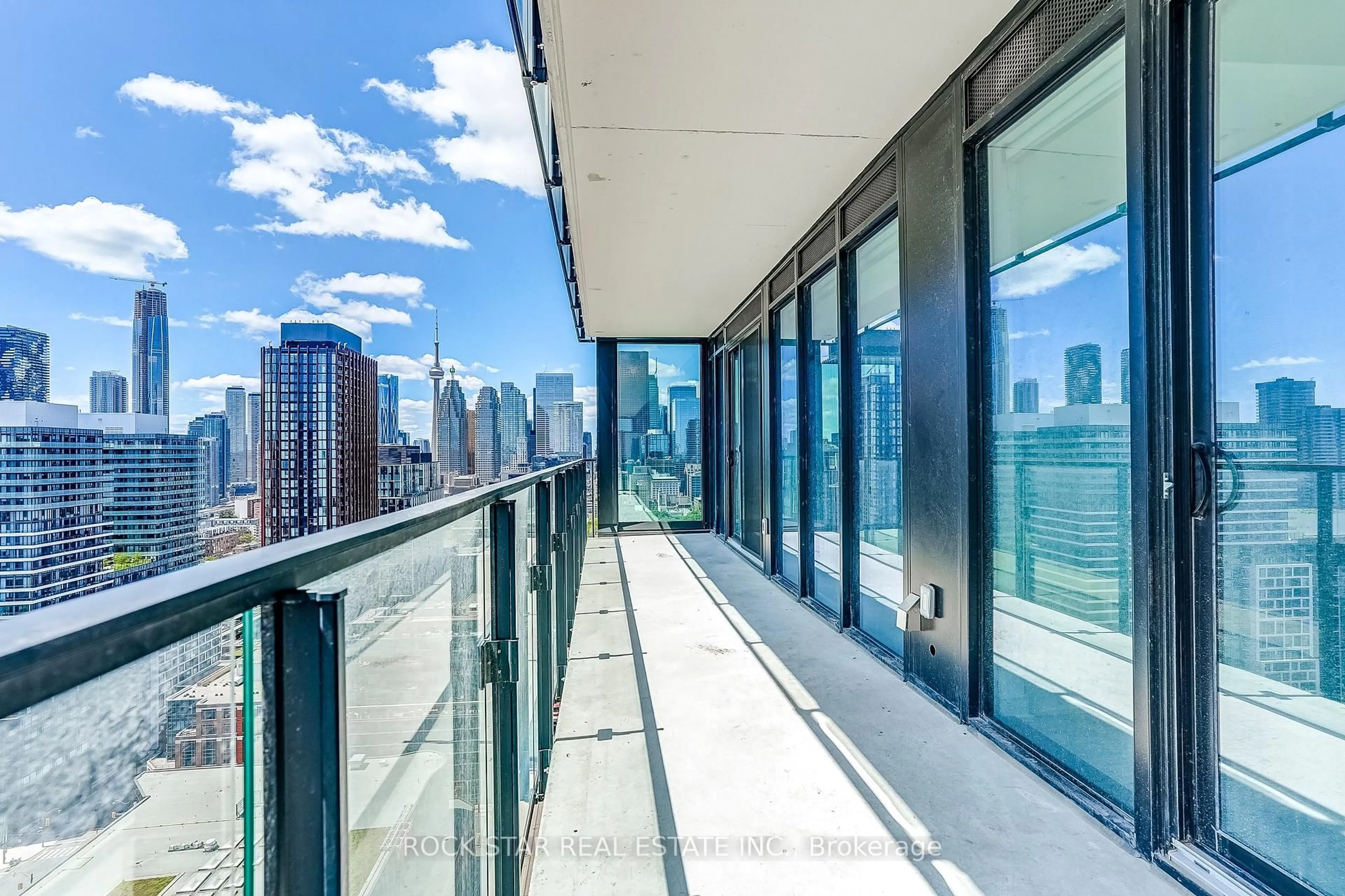Balcony in the apartment, city buildings view from balcony for 284 King St #2802, Toronto Ontario M5A 1K4