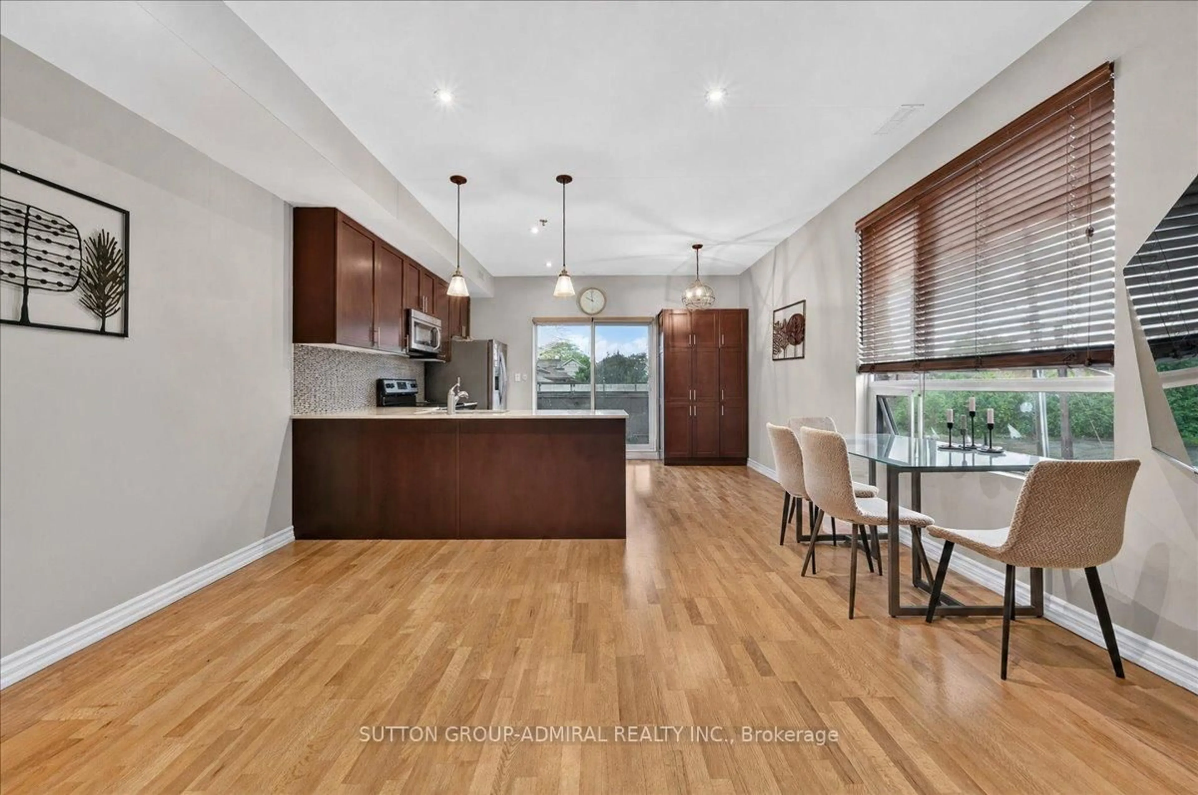 Open concept kitchen, wood/laminate floor for 2 Maxwell St #202, Toronto Ontario M3H 2S8