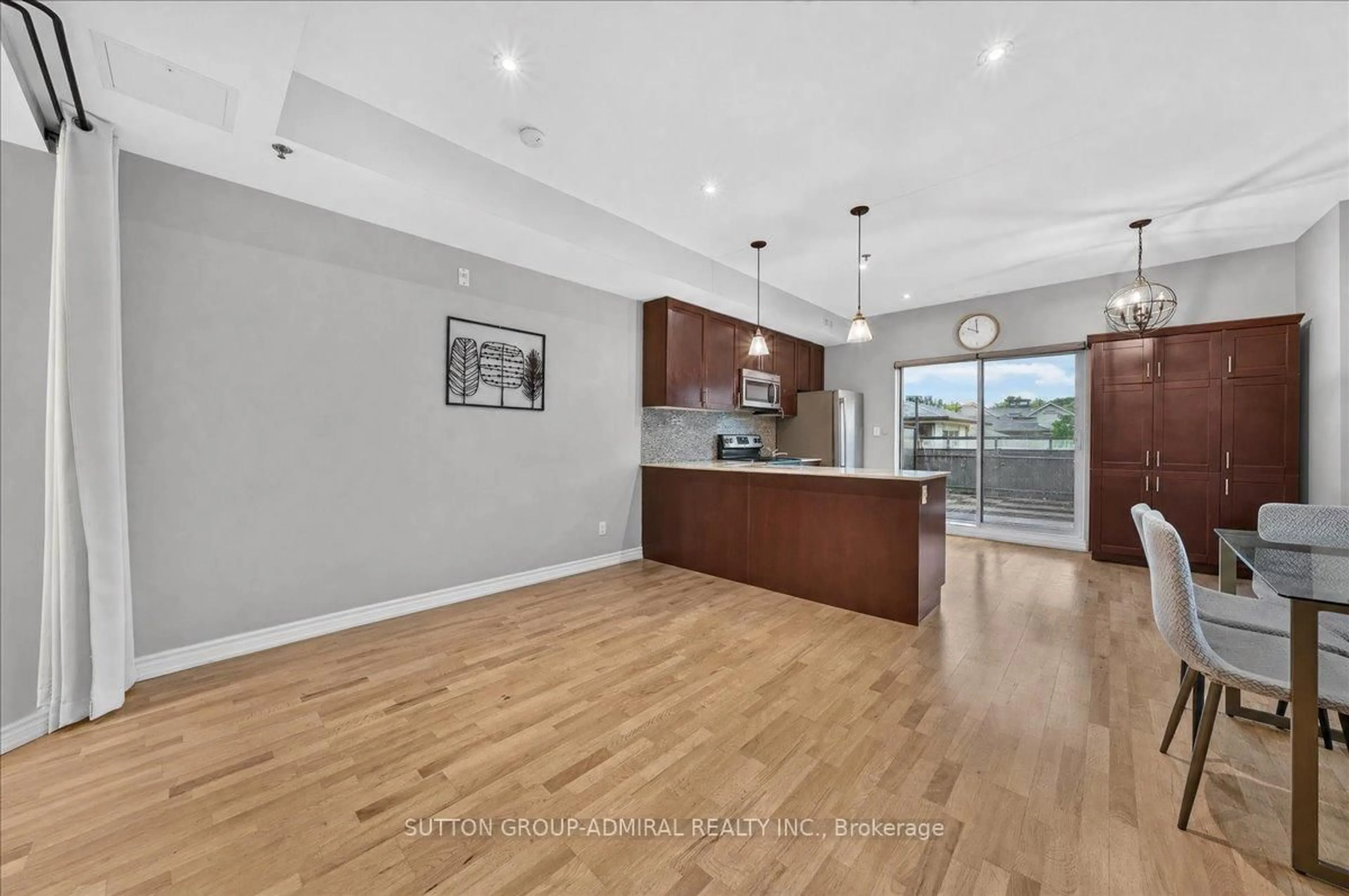 Open concept kitchen, wood/laminate floor for 2 Maxwell St #202, Toronto Ontario M3H 2S8