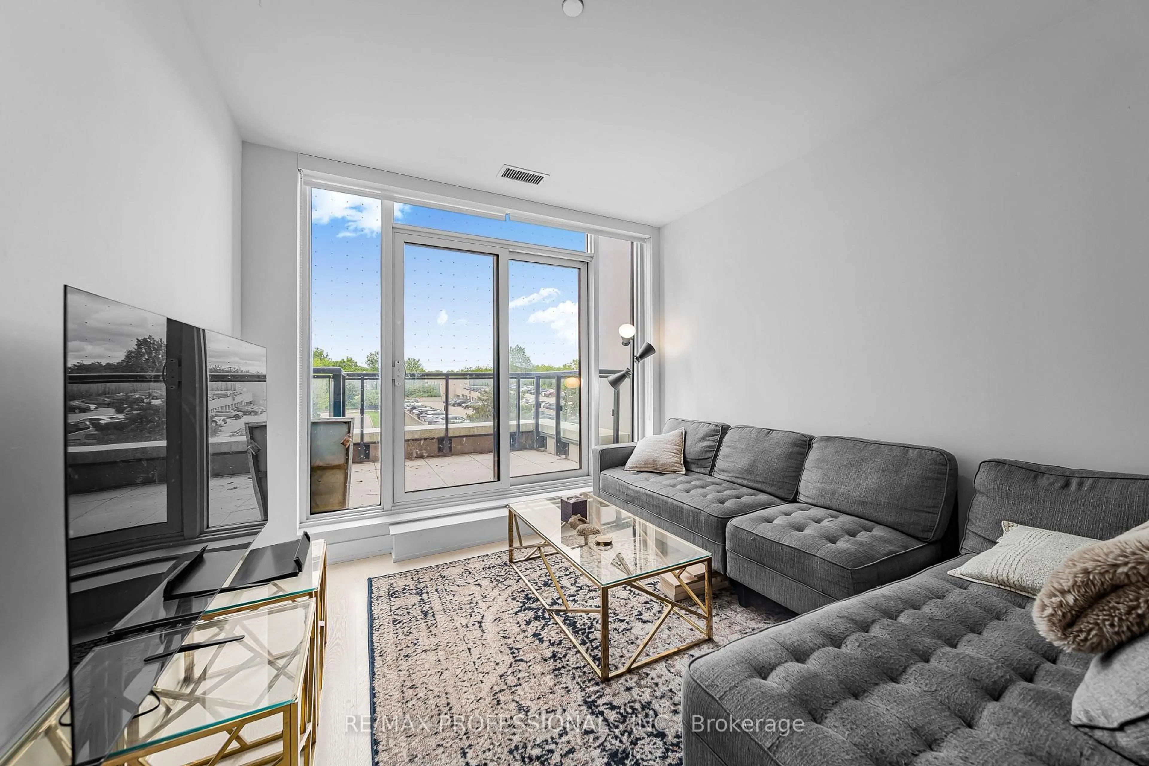 Living room with furniture, unknown for 30 Inn The Park Dr #407, Toronto Ontario M3C 0P7