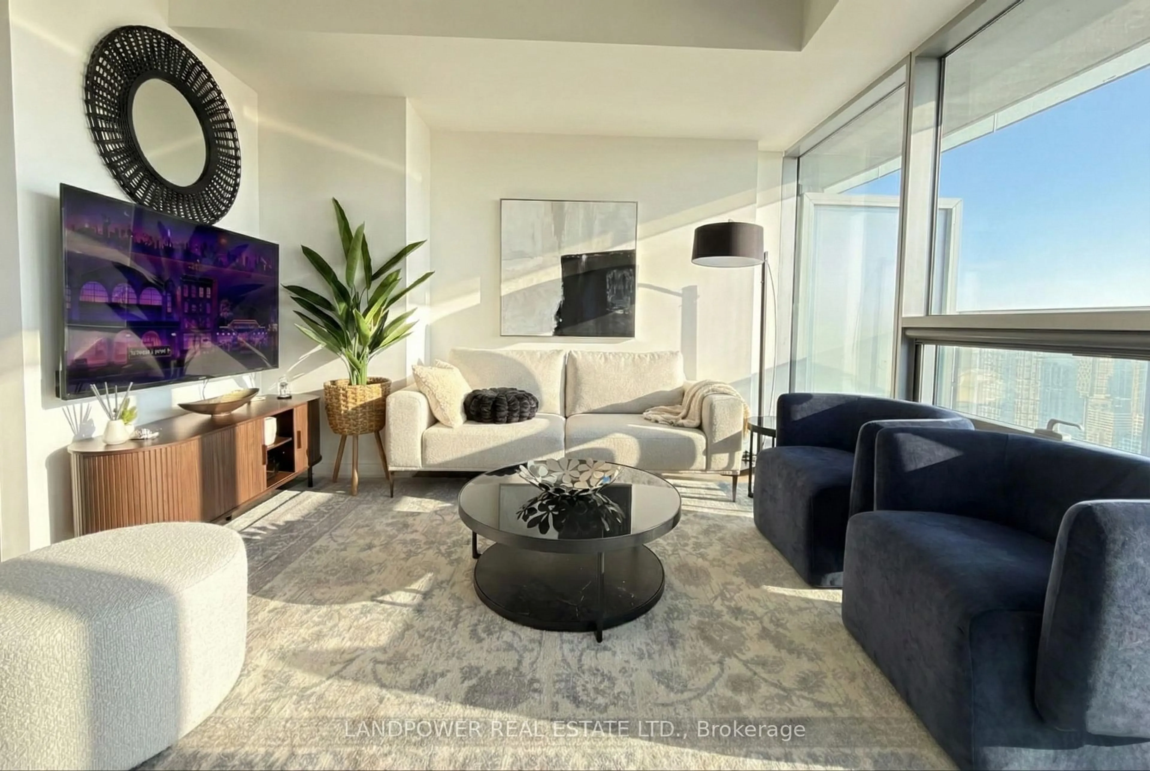 Living room with furniture, unknown for 14 York St #6009, Toronto Ontario M5J 0B1