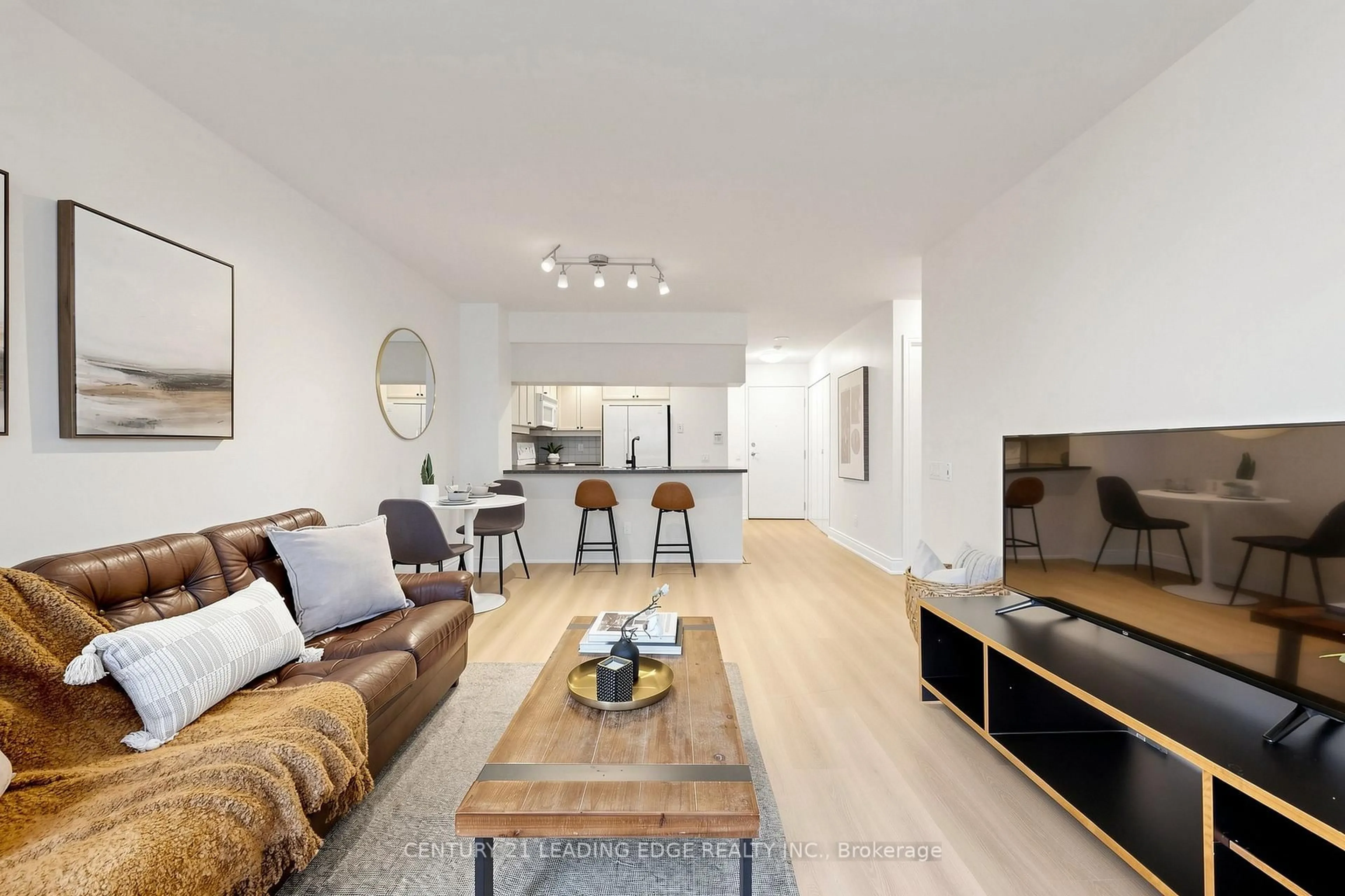 Living room with furniture, wood/laminate floor for 15 Northtown Way #328, Toronto Ontario M2N 7A2