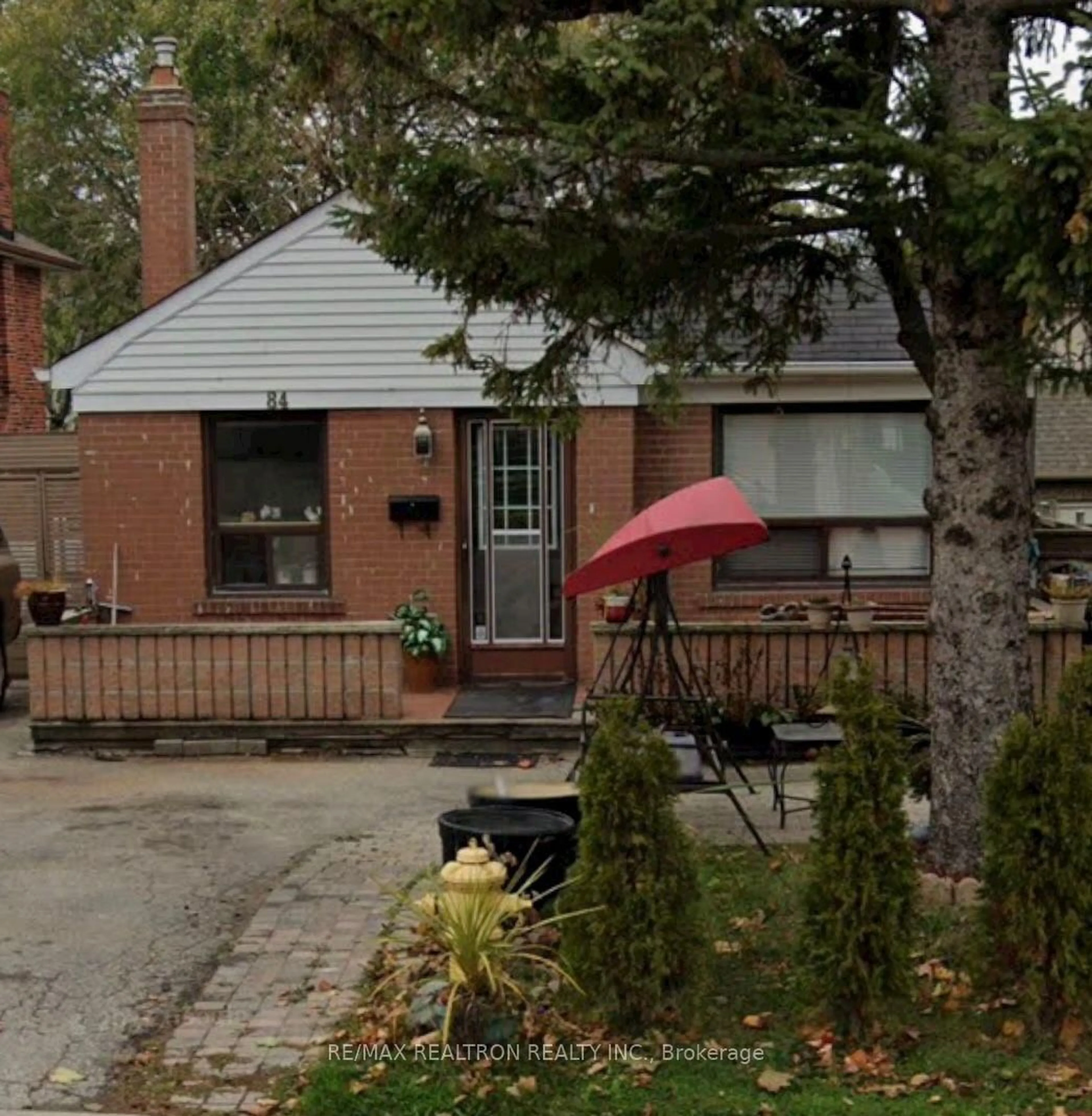 Home with brick exterior material, street for 84 Ranee Ave, Toronto Ontario M6A 1N2