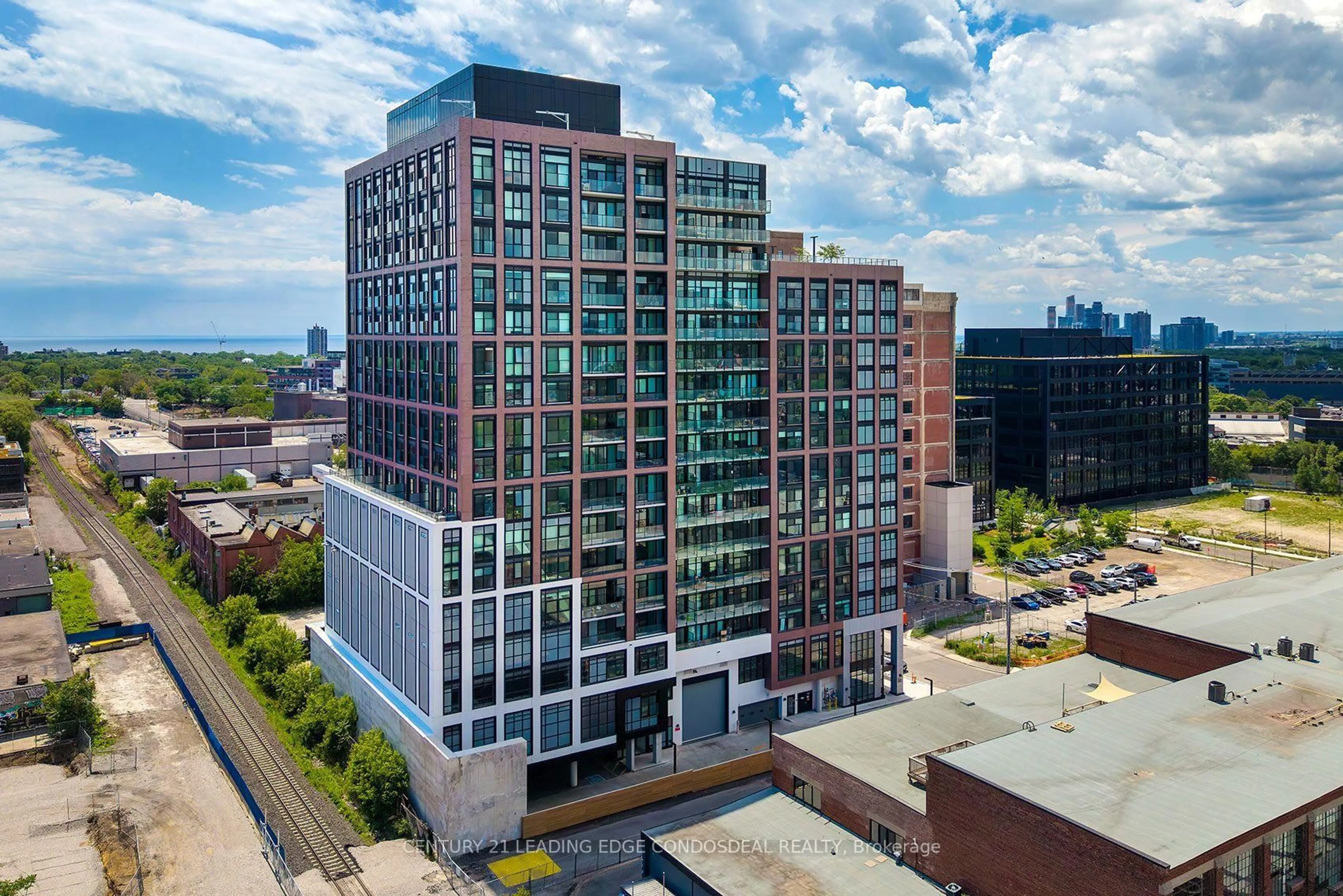 A pic from outside/outdoor area/front of a property/back of a property/a pic from drone, city buildings view from balcony for 181 Sterling Rd #315, Toronto Ontario M6R 2B2