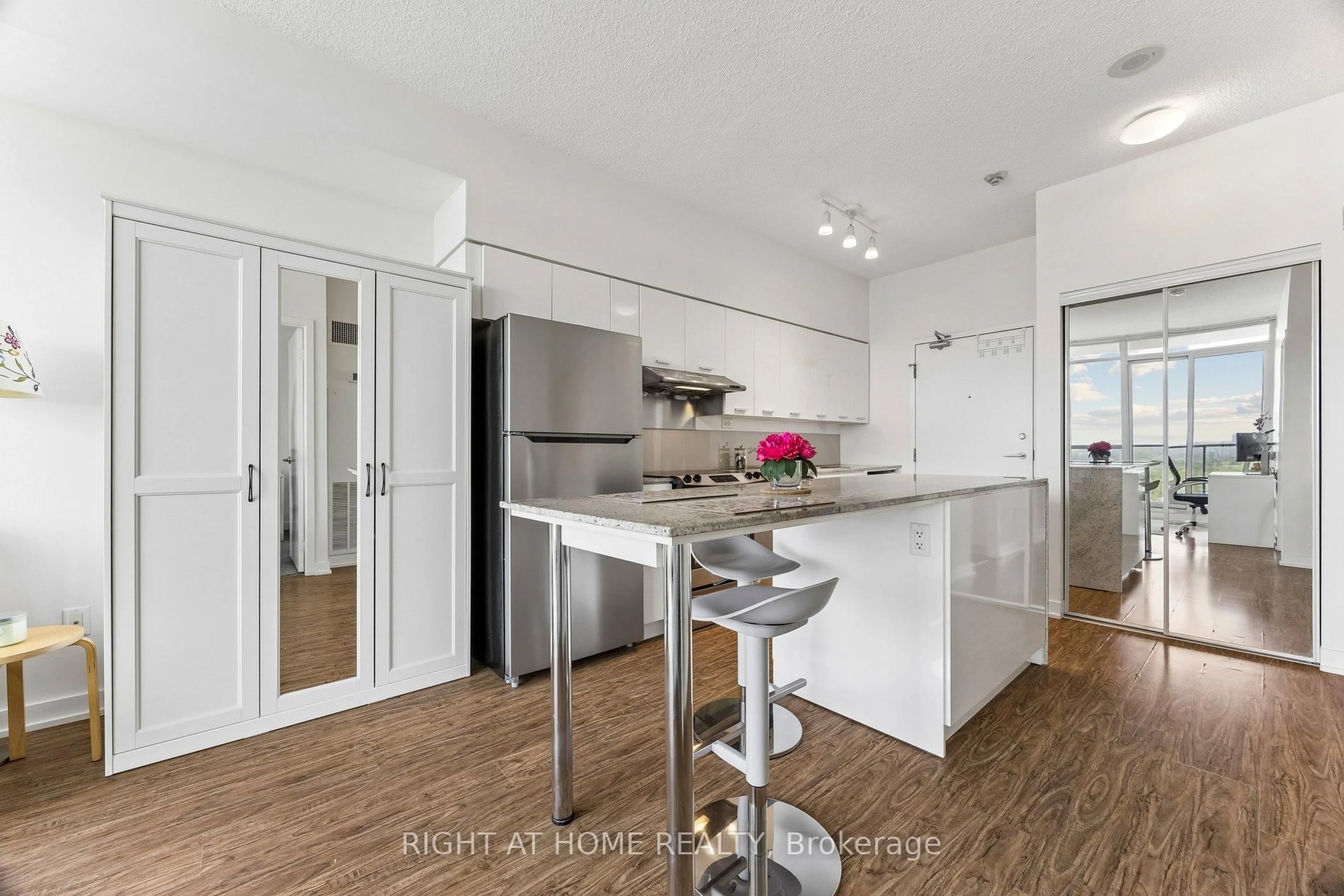 Open concept kitchen, wood/laminate floor for 29 Singer Crt #2306, Toronto Ontario M2K 0B3